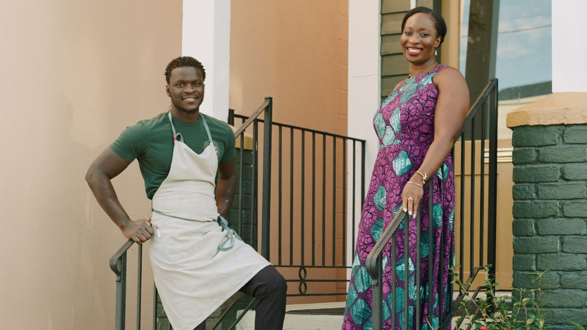 Chef Serigne Mbaye and co-owner Effie Richardson pose for a photo on the steps on Dakar NOLA's porch.