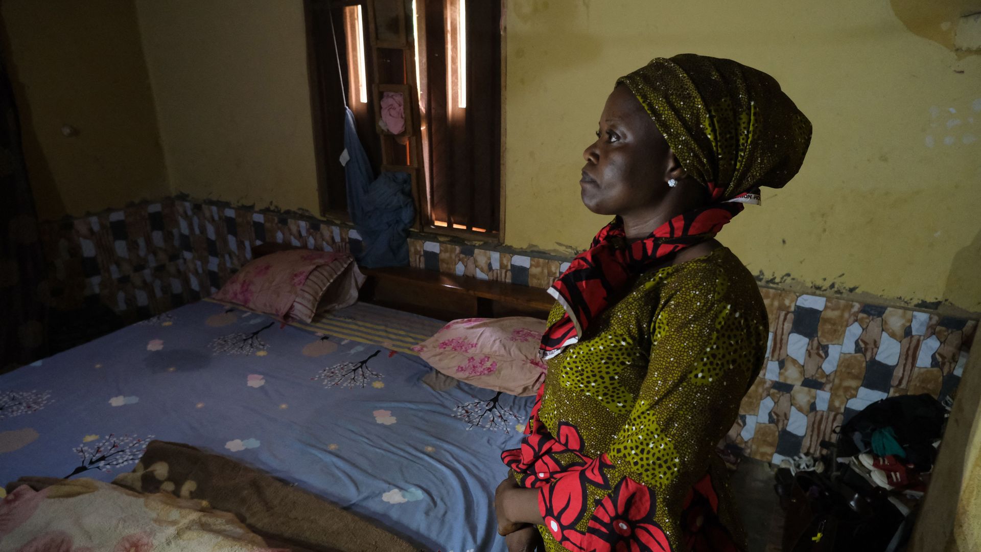 Hassana Ayuba, one of the parents of the abducted students of Bethel Baptist High School, looks on in her home following the abduction of her 14-year-old daughter.