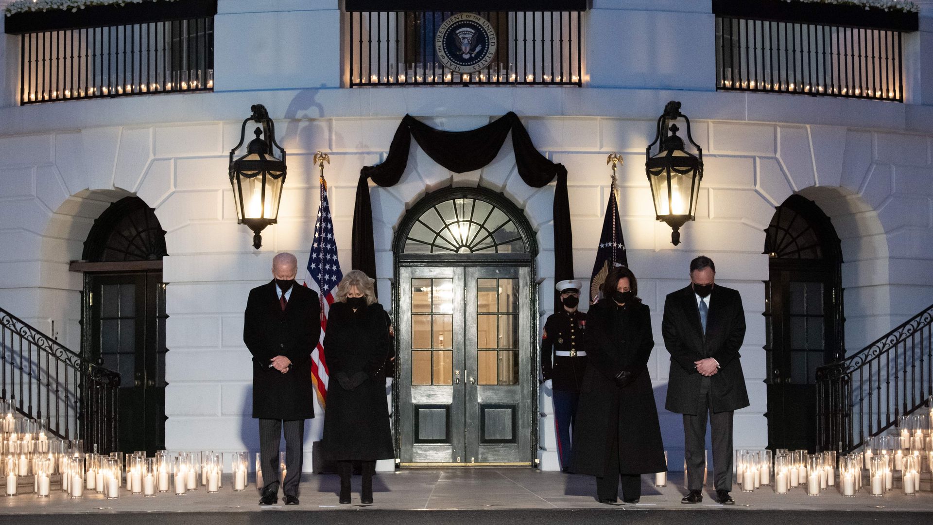President Biden, Vice President Kamala Harris and their spouses are seen during a moment of silence to remember the nation's COVID victims.