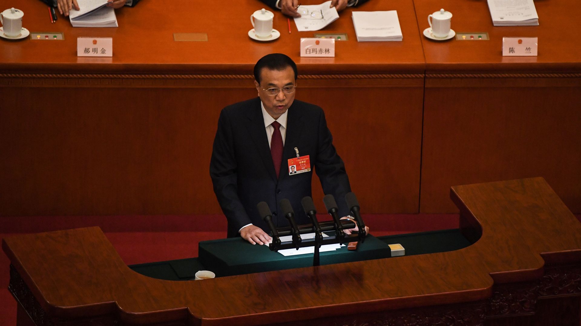 China's Premier Li Keqiang delivers his work report during the opening session of the National People's Congress 