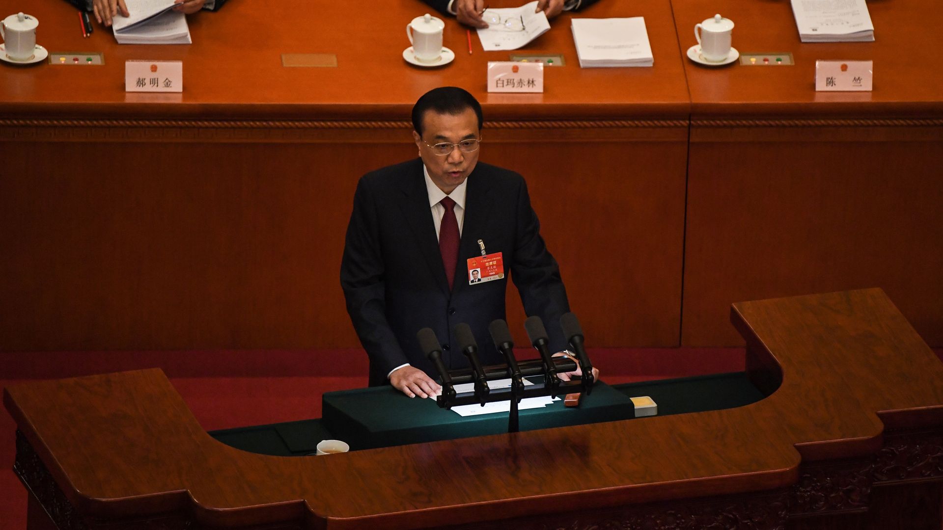China's Premier Li Keqiang delivers his work report during the opening session of the National People's Congress