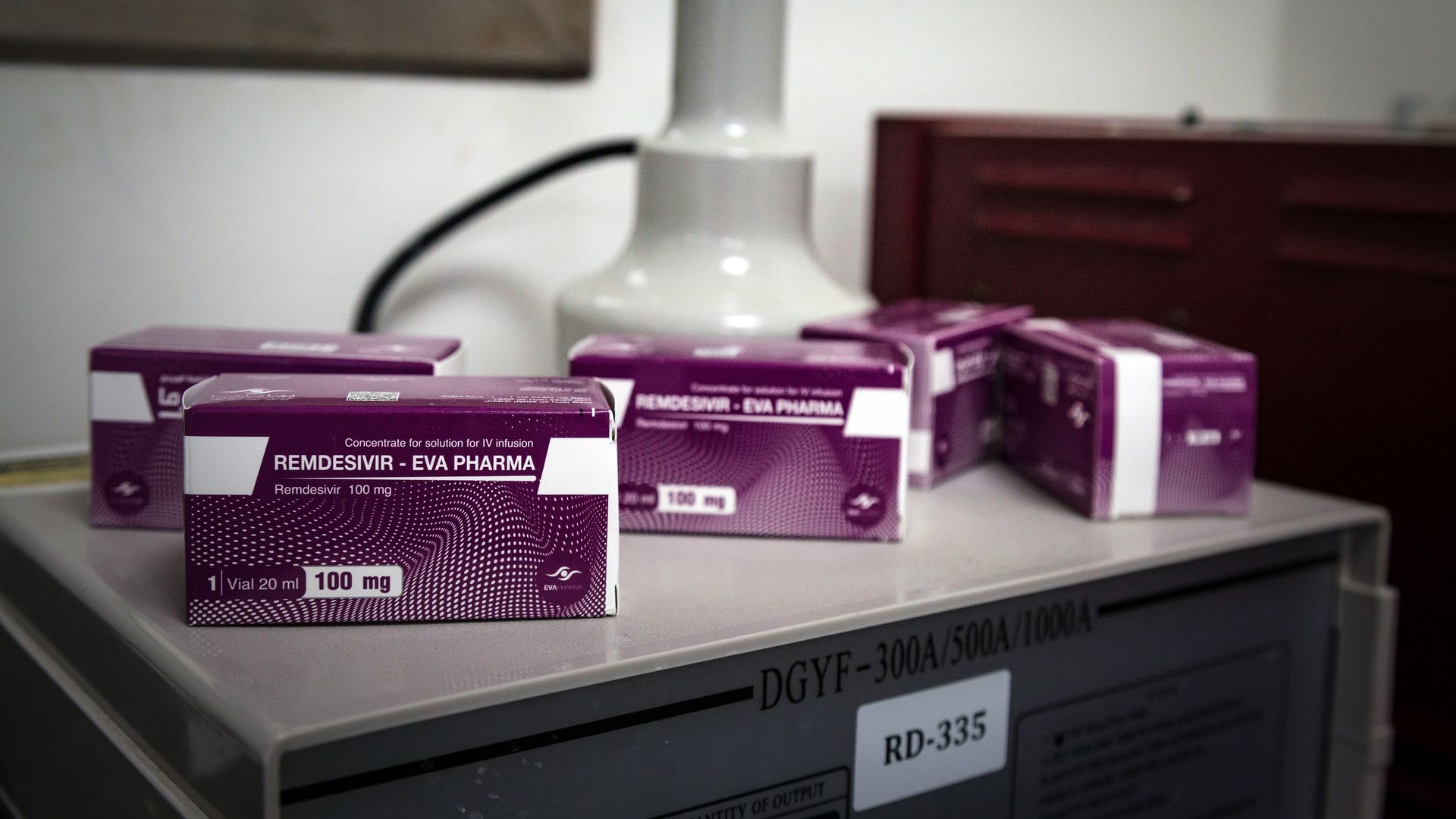 Picture of boxes of remdesivir sitting on a counter