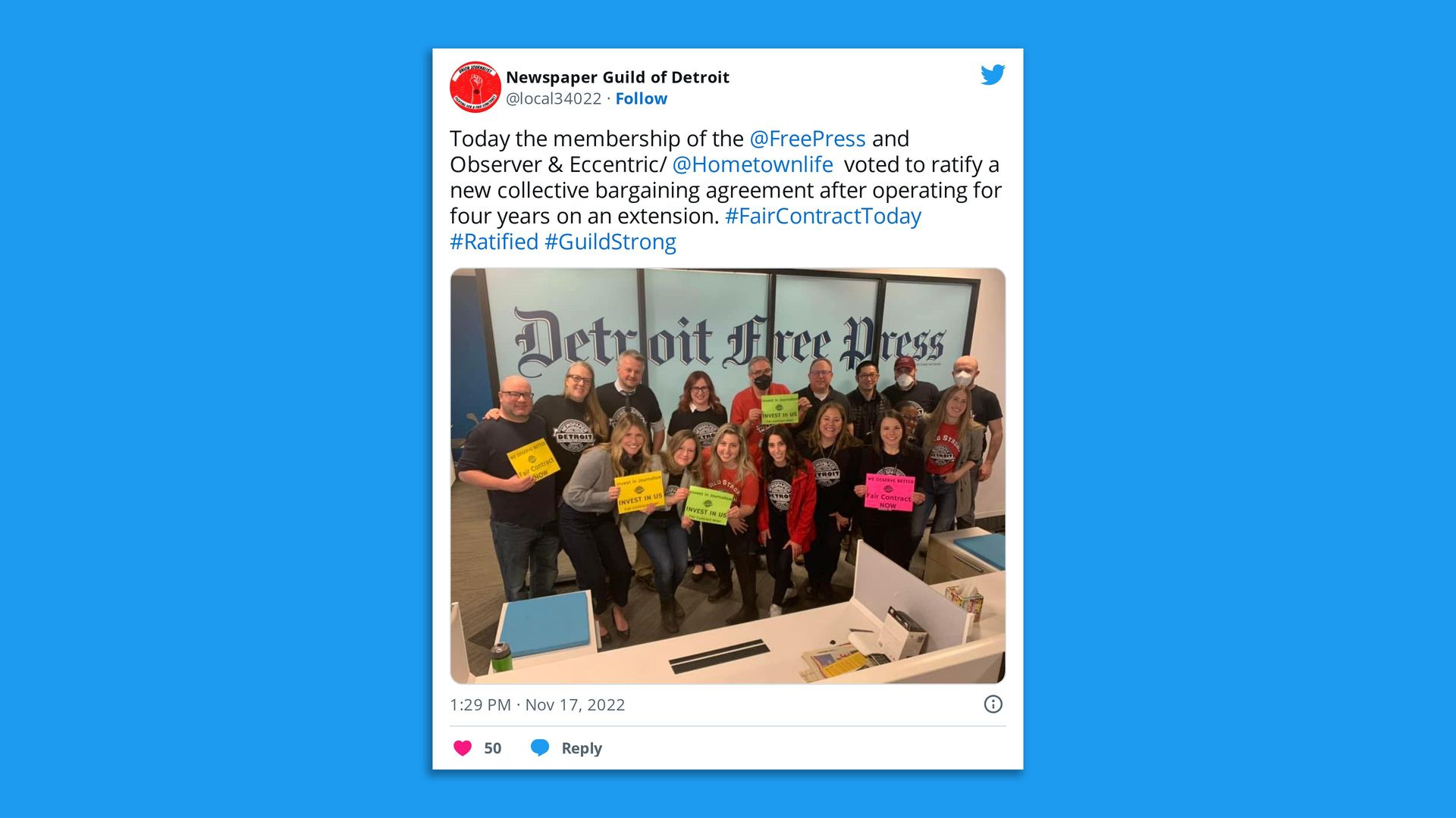 Free Press journalists inside the newsroom.