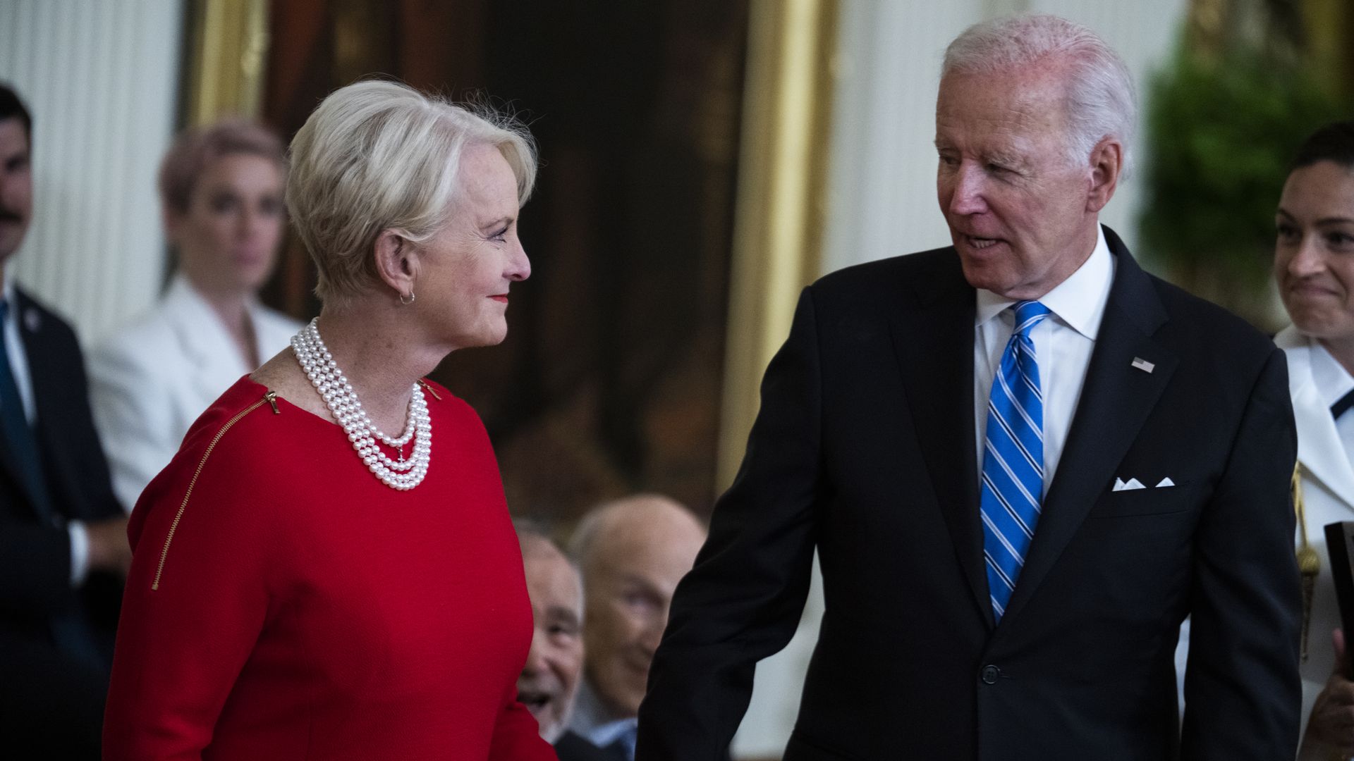 President Biden and Cindy McCain at a ceremony 