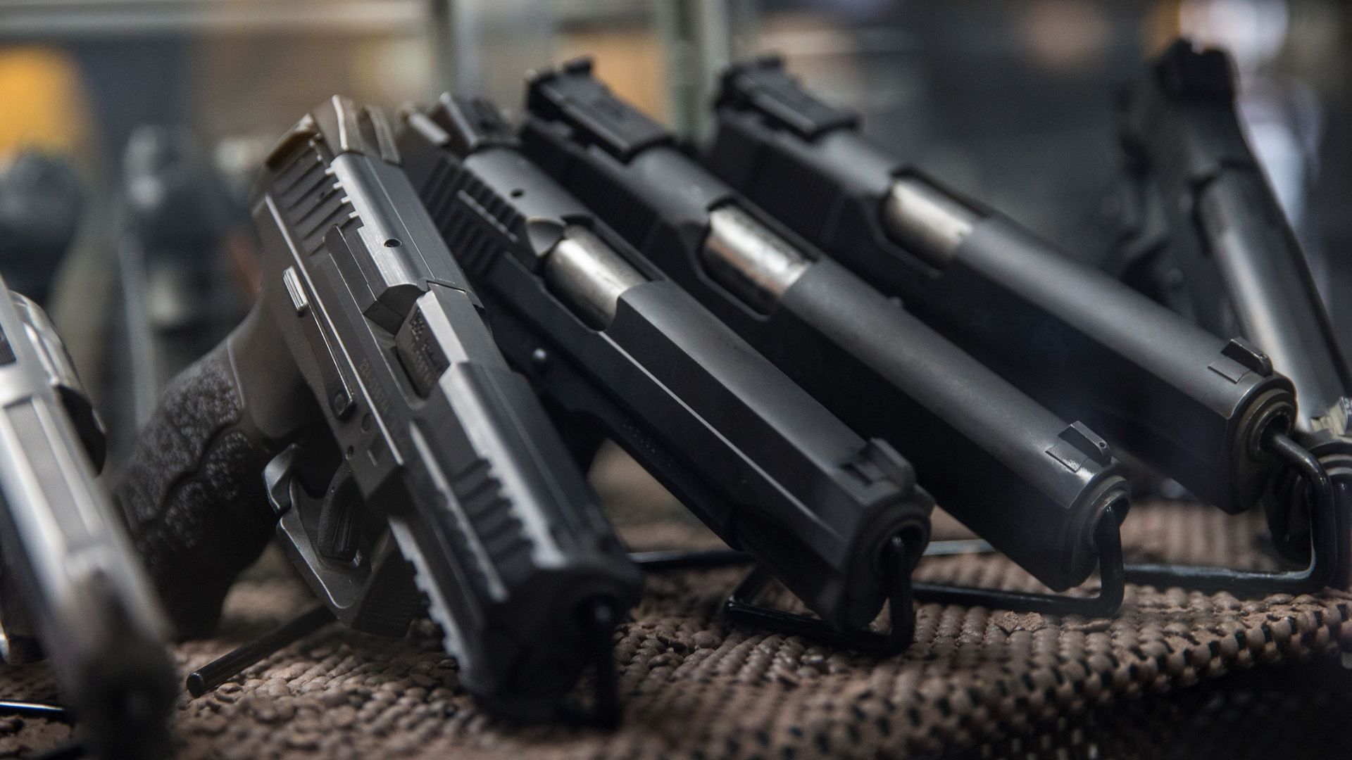 Assorted pistols on display