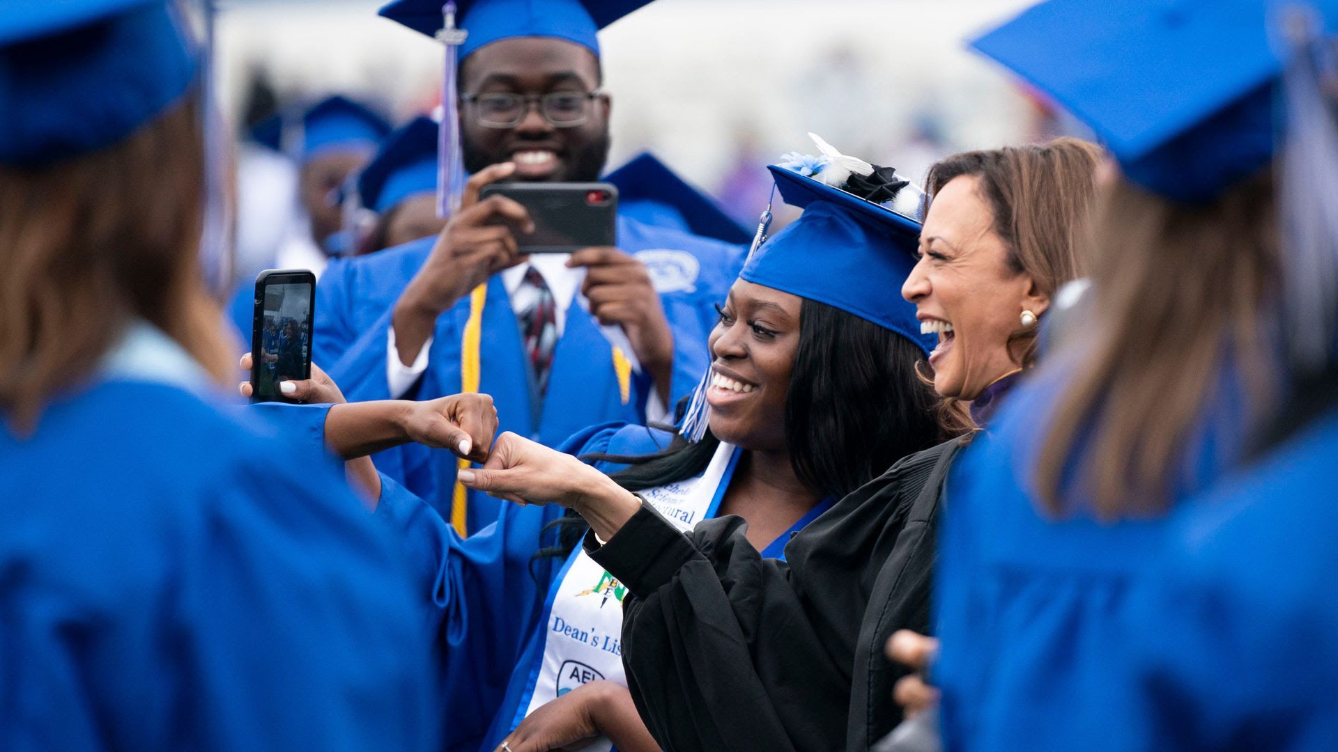 Vice President Kamala Harris laughs with Tennessee State University graduates.