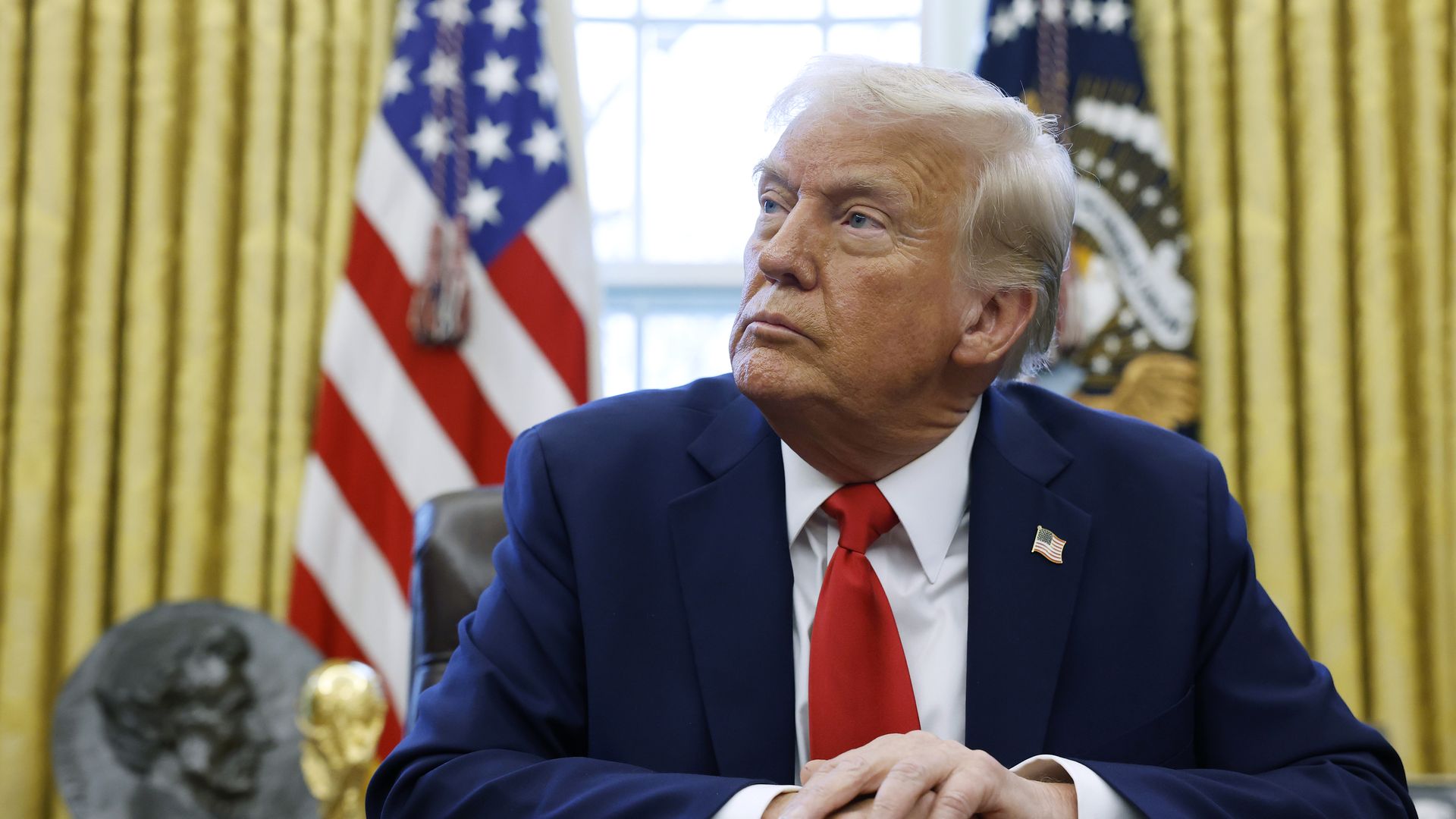 President Trump speaks to reporters in the Oval Office of the White House on Feb. 3, 2025, in Washington, D.C. 