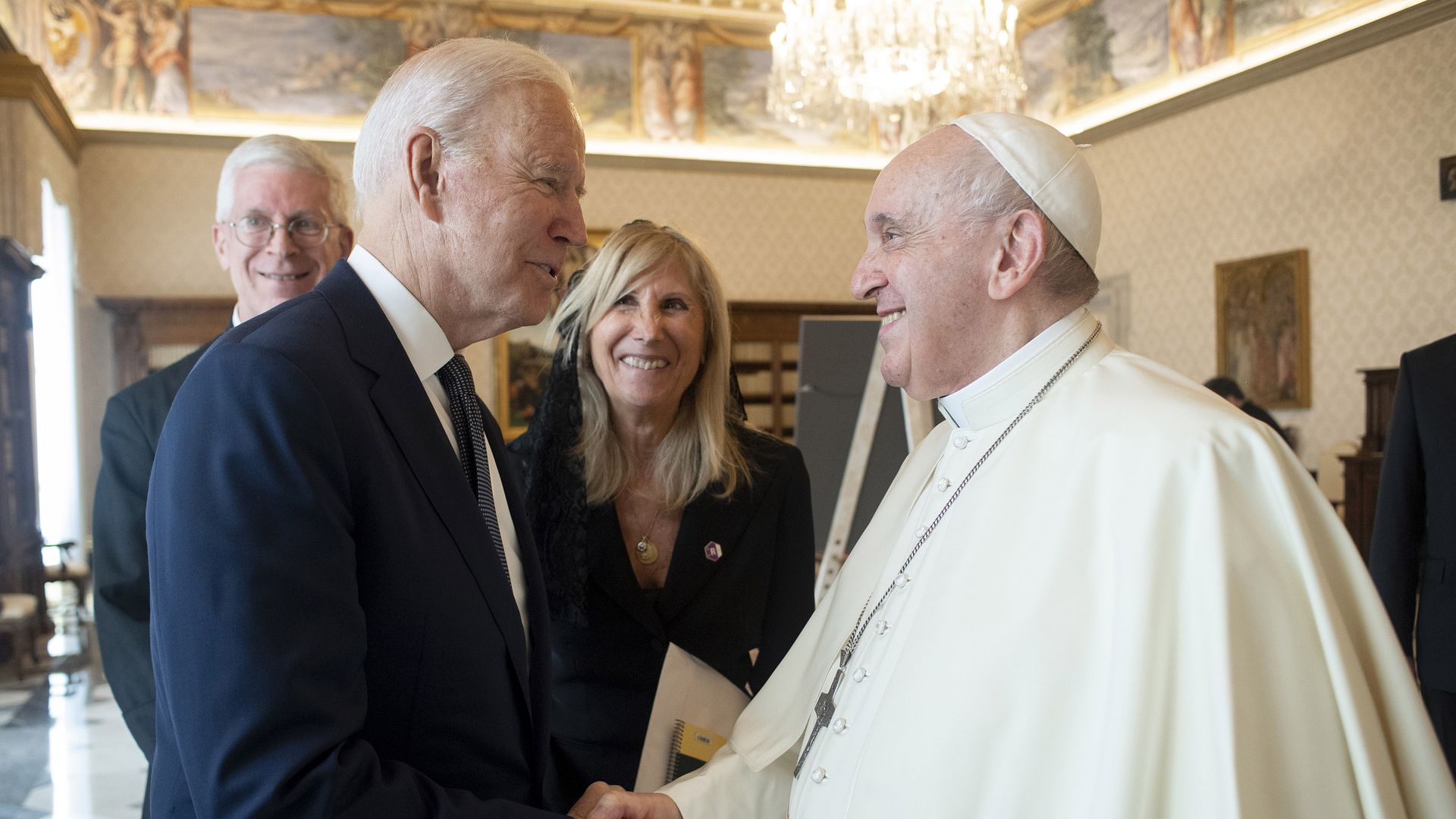Picture of President Biden shaking Pope Francis' hand
