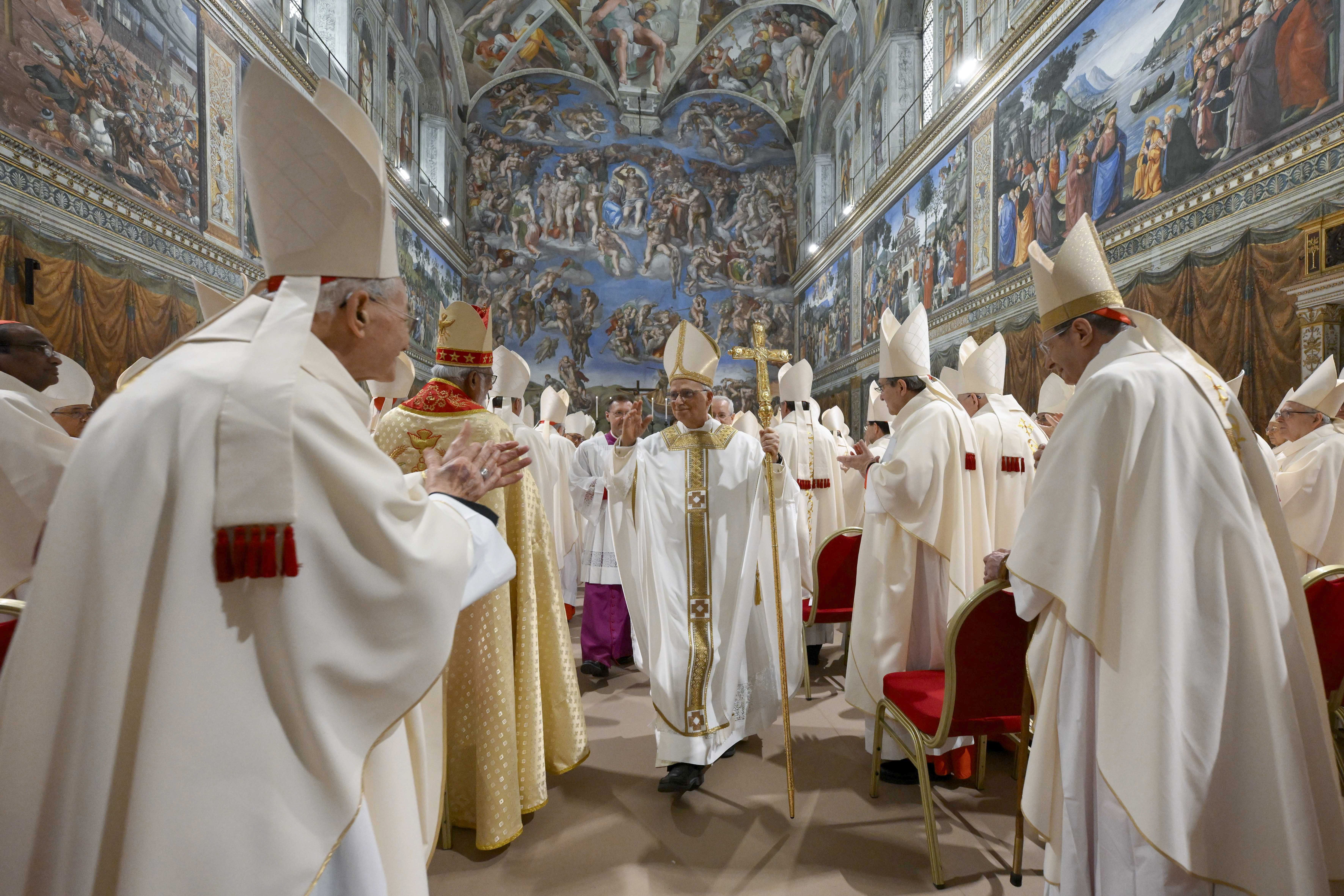 VATICAN CITY, VATICAN - MAY 09: (EDITOR NOTE: STRICTLY EDITORIAL USE ONLY - NO MERCHANDISING). American Cardinal Robert Francis Prevost presides over his first Holy Mass as Pope Leo XIV with cardinals in the Sistine Chapel at the conclusion of the Conclave on May 09, 2025 in Vatican City, Vatican. W