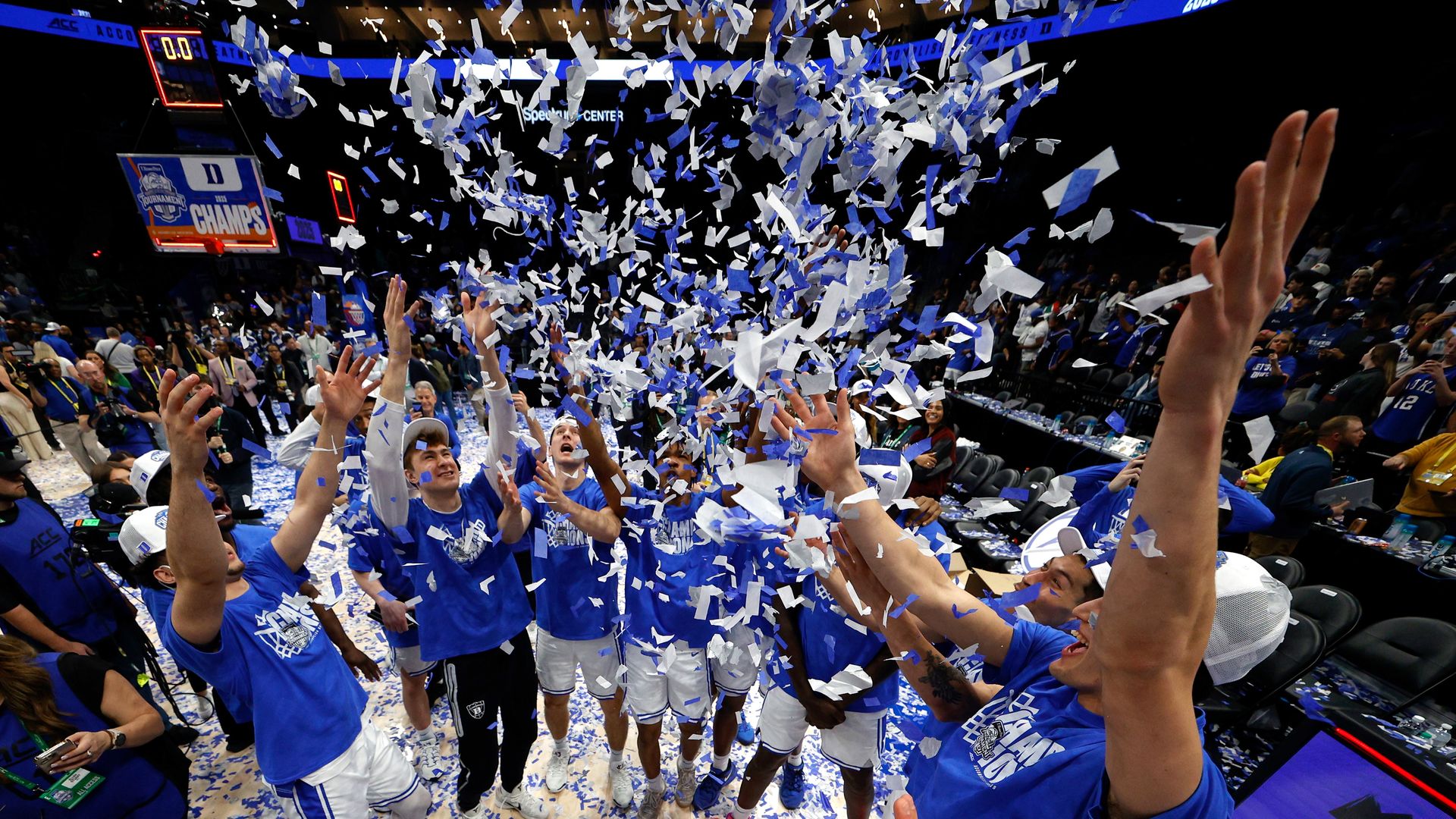 Players of the Duke Blue Devils throw confetti up following their win against the Louisville Cardinals in the championship game of the ACC men's basketball tournament at Spectrum Center on March 15, 2025 in Charlotte, North Carolina. (Photo by Lance King/Getty Images)