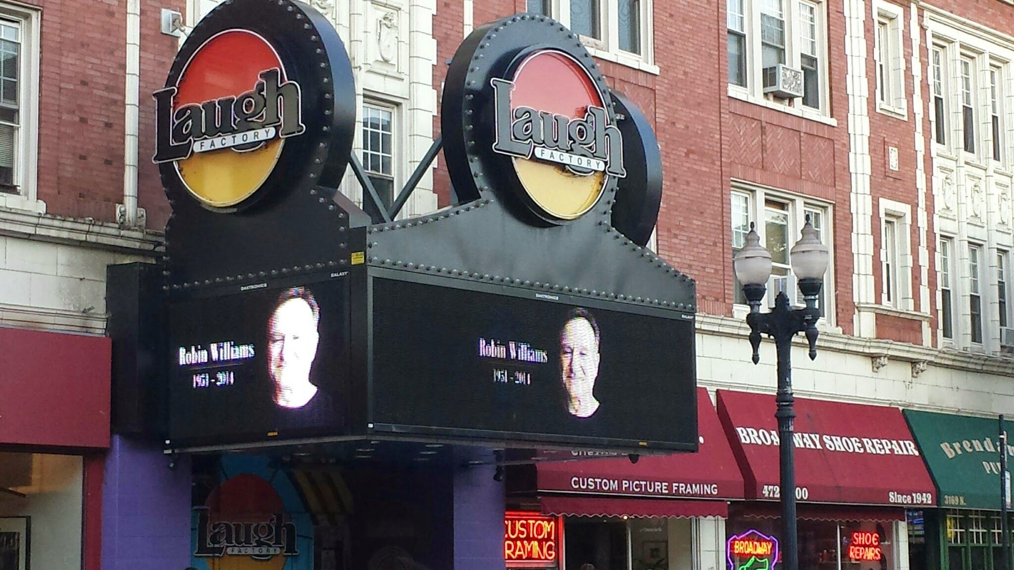 Photo of a marquee that says "Laugh Factory" 