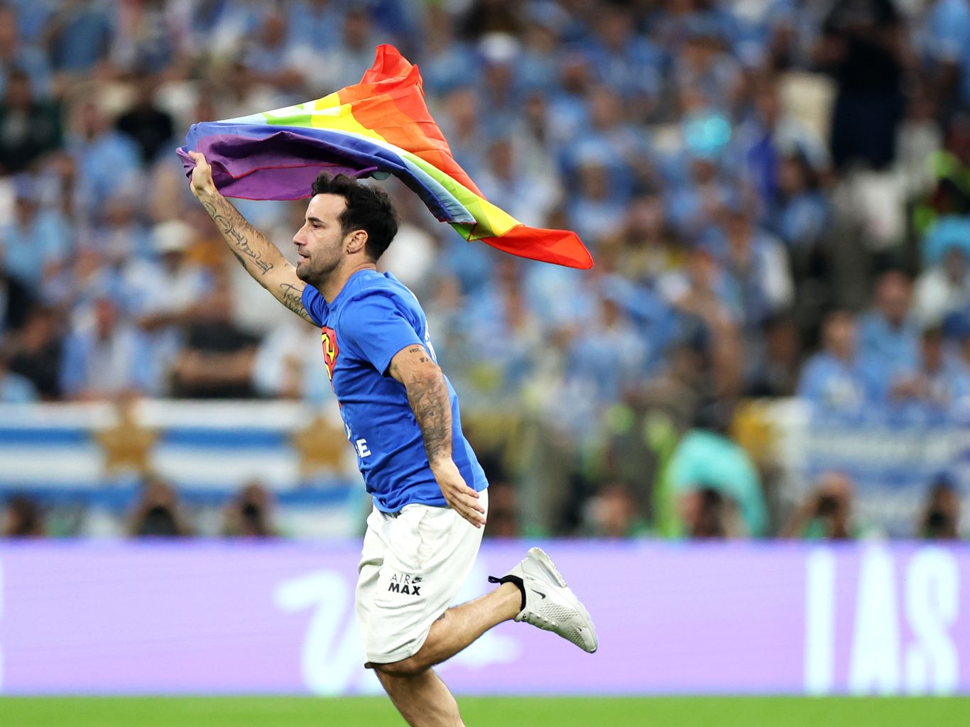 Protester with rainbow flag runs onto field at World Cup - The Athletic