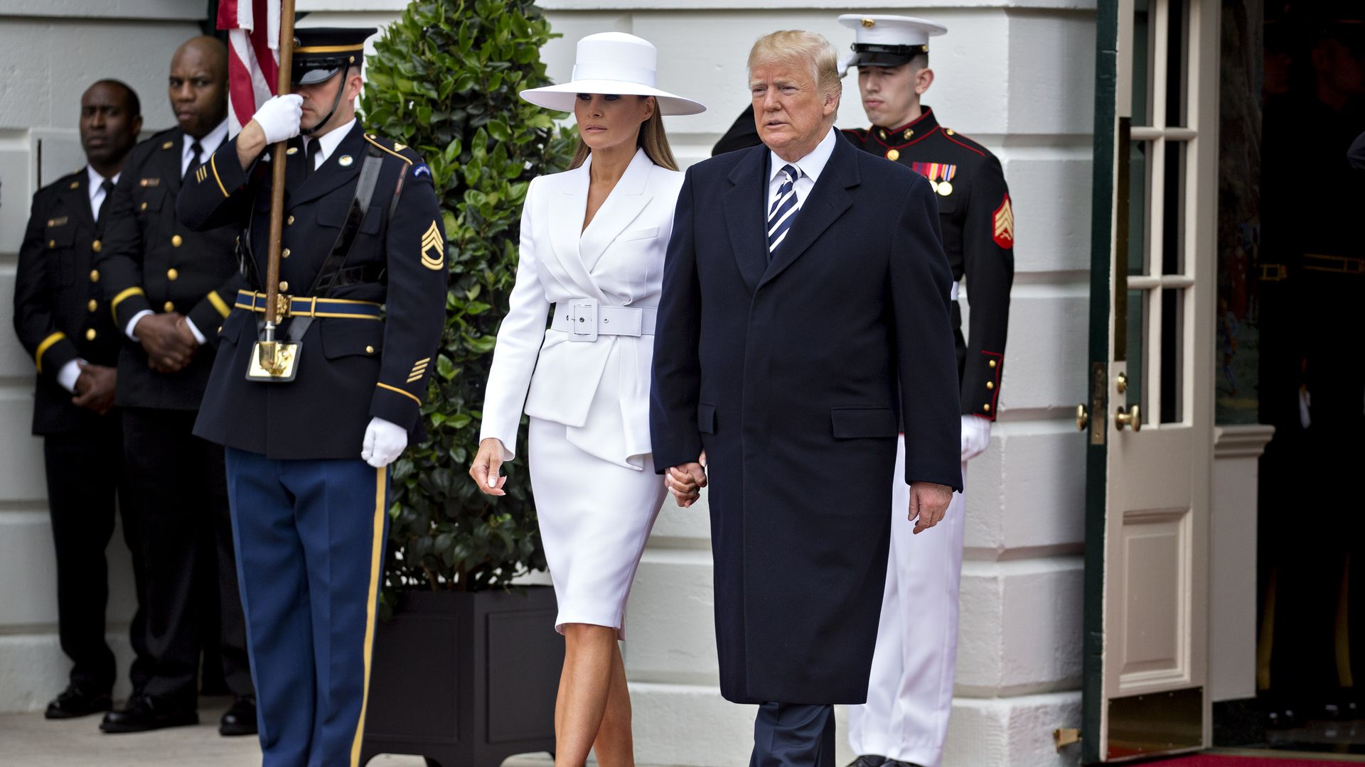 Picture of Melania Trump and Donald Trump holding hands