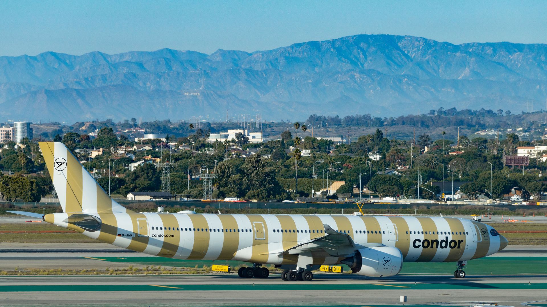 A Condor Airlines plane on the runway.