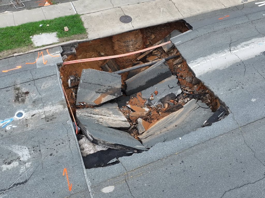 Massive sinkhole closes street near Bank of America Stadium