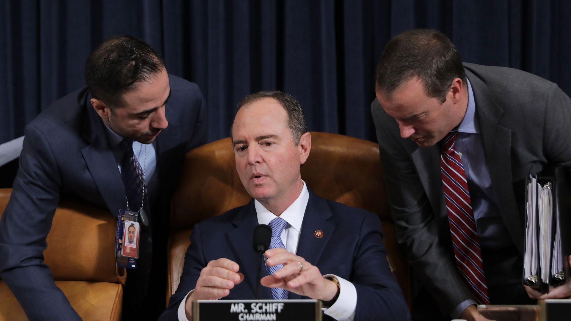 Adam Schiff hears from staff members at an impeachment hearing