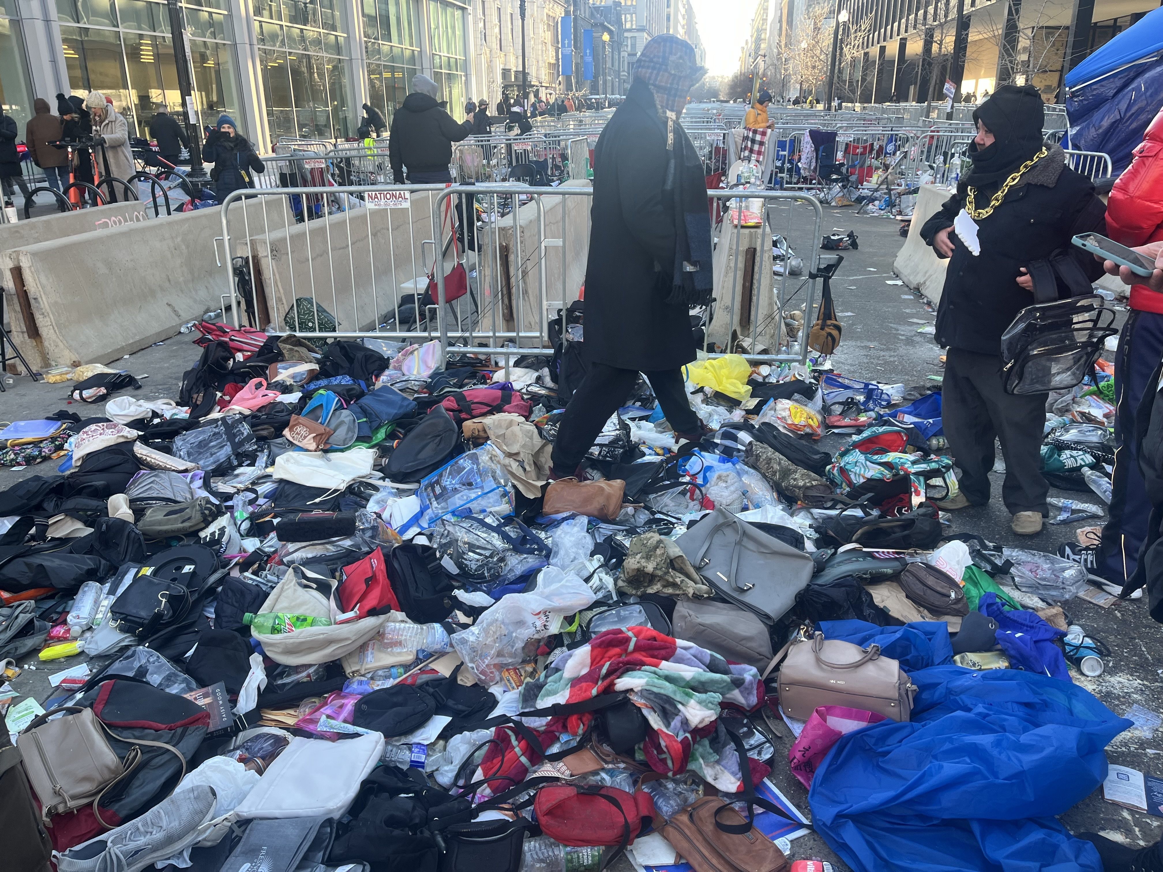 Heaps of trash of all colors and sizes - bags and purses, mostly - litter the streets of D.C. near the Capital One Arena.