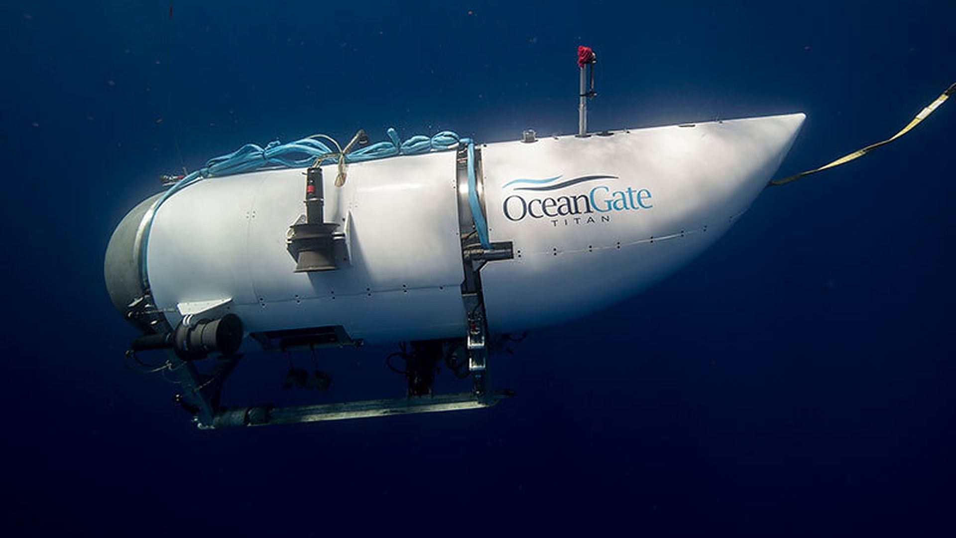 An undated photo shows tourist submersible belongs to OceanGate begins to descent at a sea. Search and rescue operations continue by US Coast Guard in Boston after a tourist submarine bound for the Titanic's wreckage site went missing off the southeastern coast of Canada.