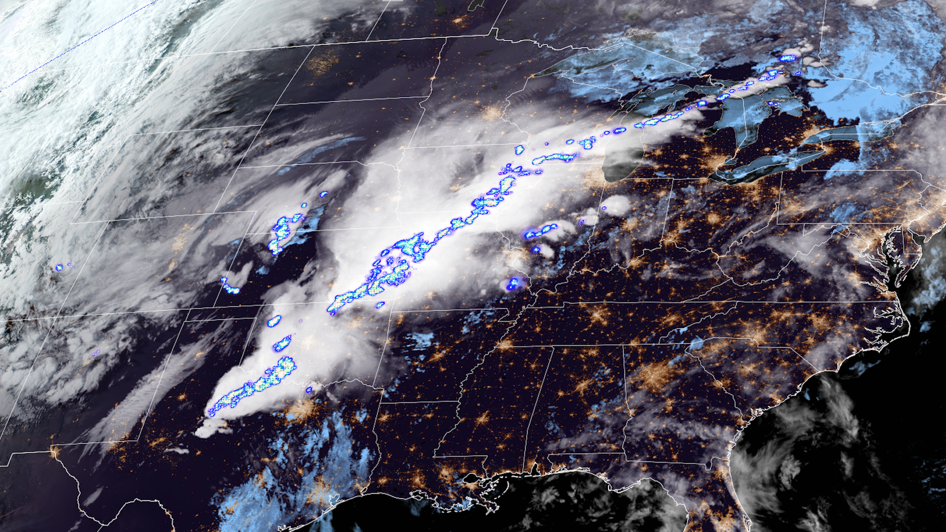 Satellite photo showing severe thunderstorms just after dark on April 27, with lightning flashes detected.