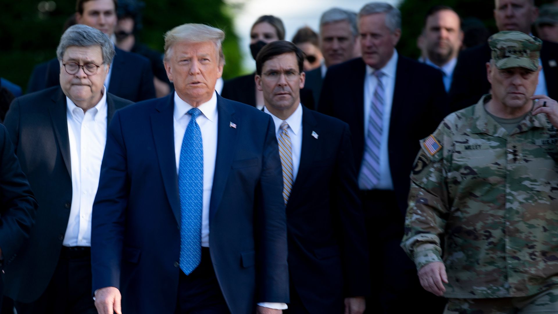 President Trump and Defense Secretary Mark Esper walk through Lafayette Park