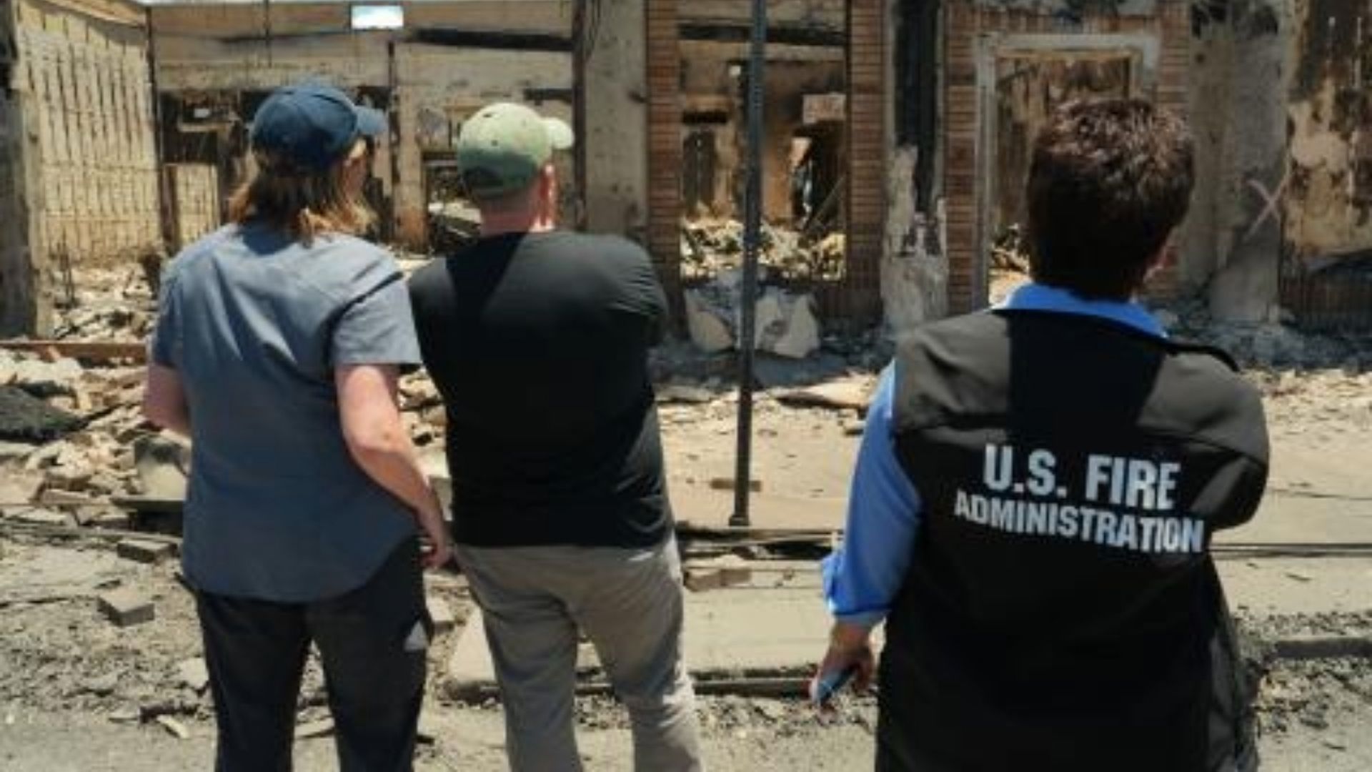 FEMA Administrator Deanne Criswell (left), U.S. Fire Administrator Moore-Merrell (right) and Hawaii Gov. Josh Green tour wildfire damages. (FEMA photo).