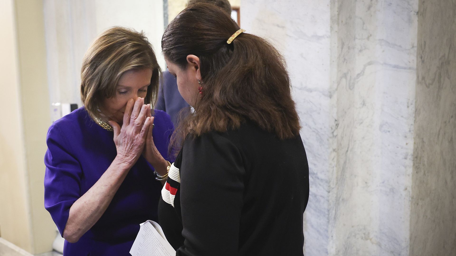 House Speaker Nancy Pelosi is seen chatting privately with Ukraine's ambassador to the United States.