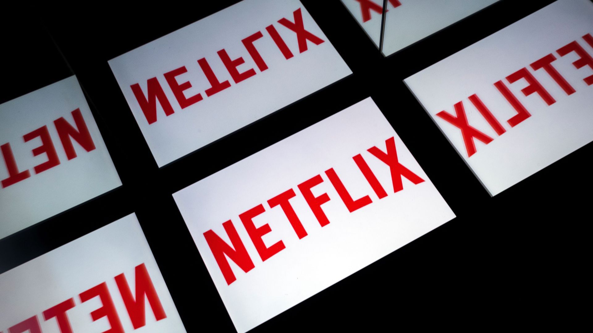 Screens with the Netflix logo