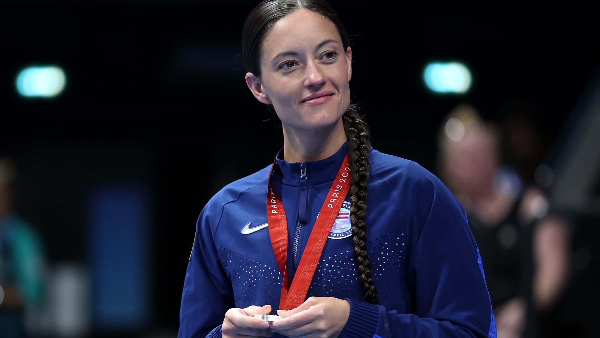 Ellie Marks holds one of her five silver medals at the Paris 2024 Summer Paralympic Games. Photo: Sean M. Haffey/Getty Images