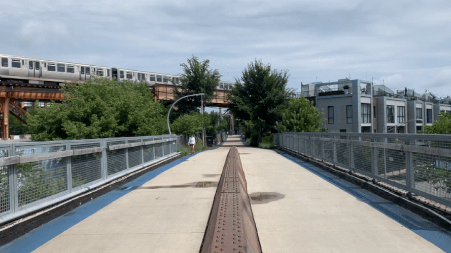 GIF of a train going by a trail 