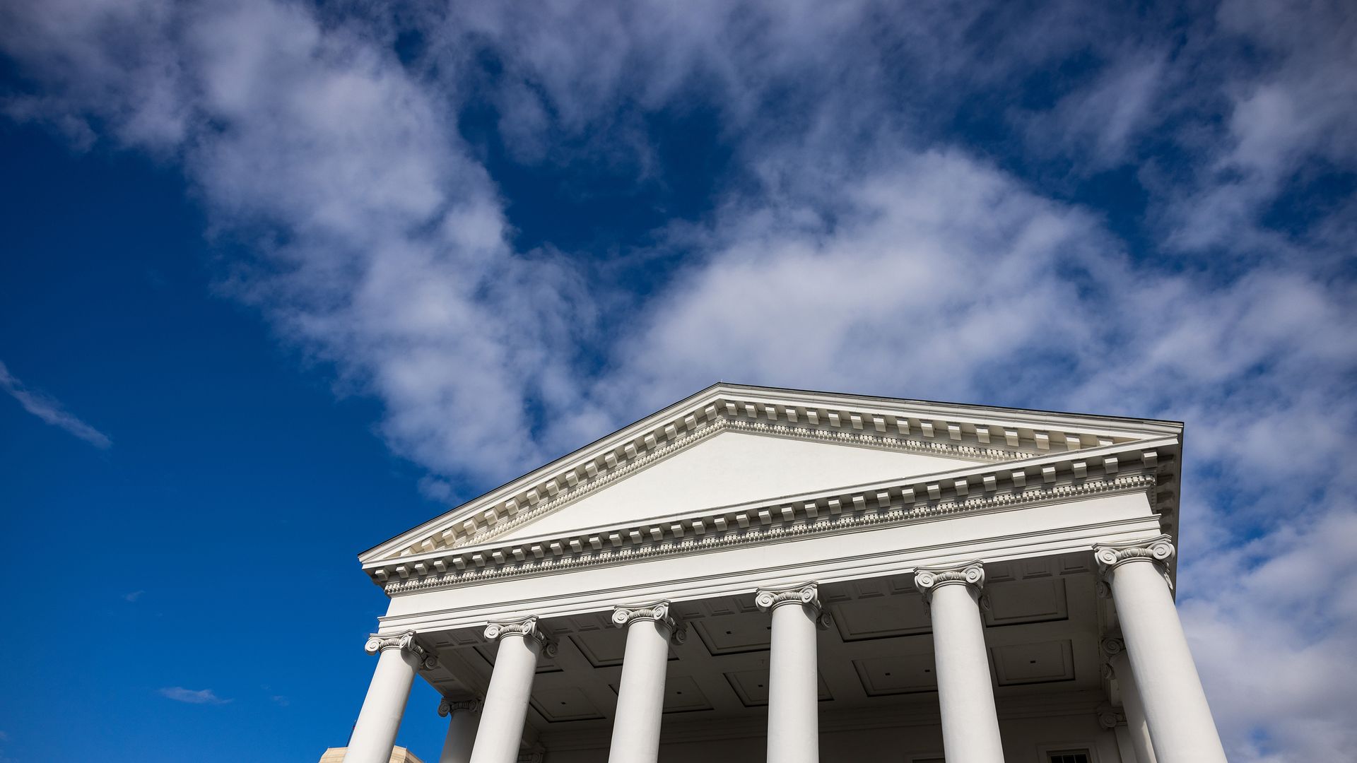 The virginia state capitol on a cloudy day