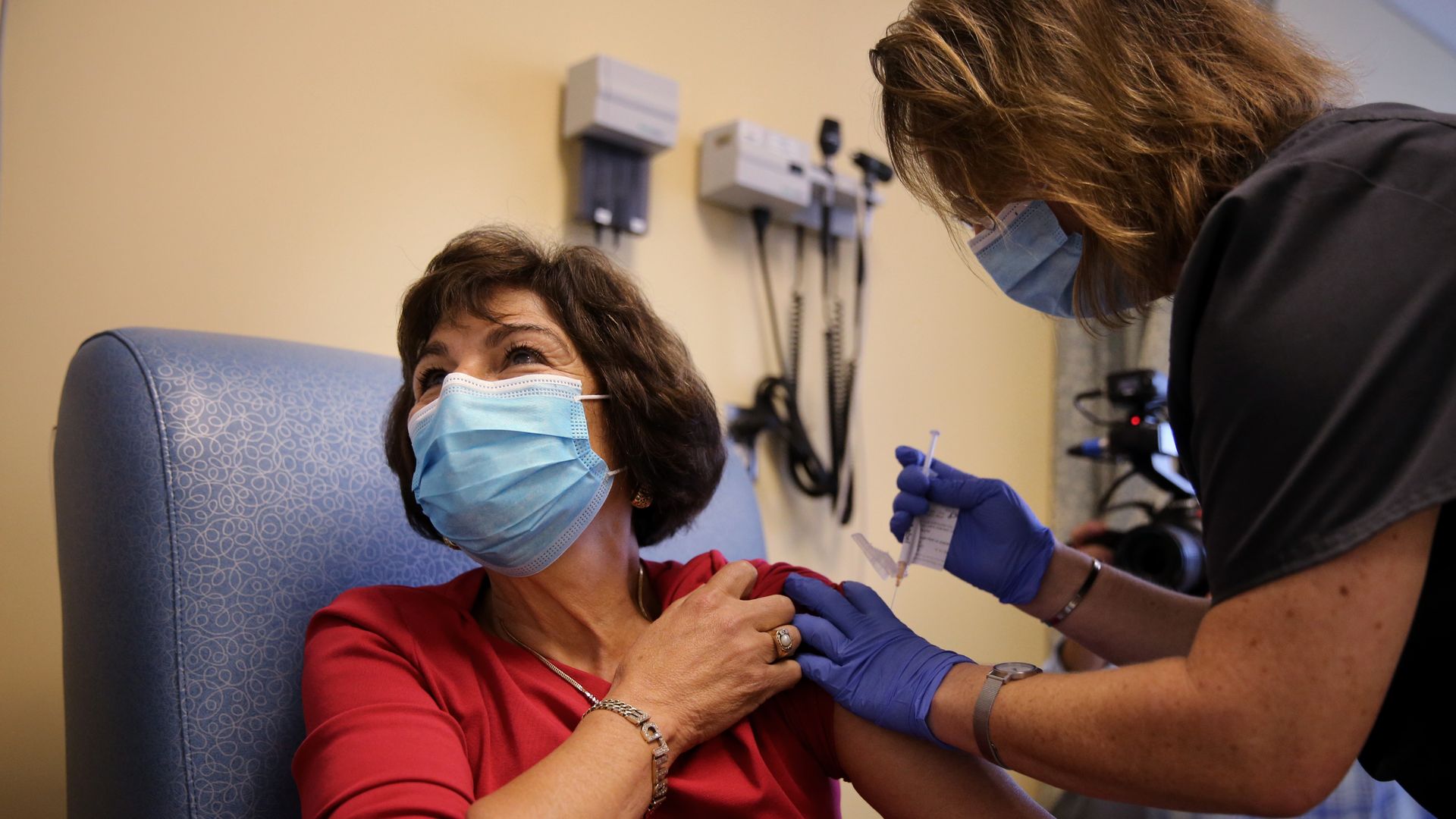 A volunteer is injected with a vaccine as he participates in a coronavirus disease (COVID-19) vaccination study at the University of Massachusetts Medical School in Worcester, MA