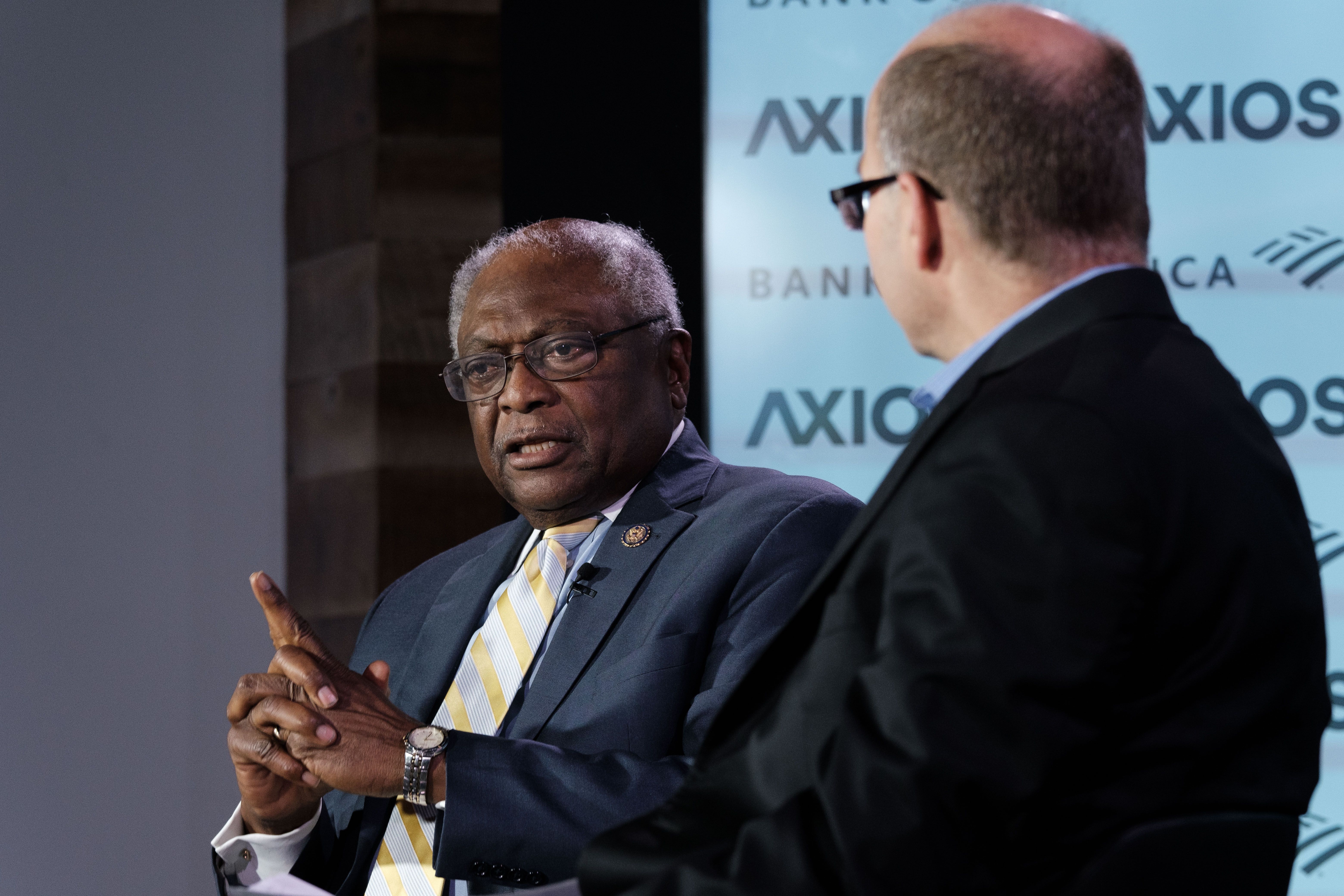 James Clyburn and Mike Allen sit on the Axios stage.