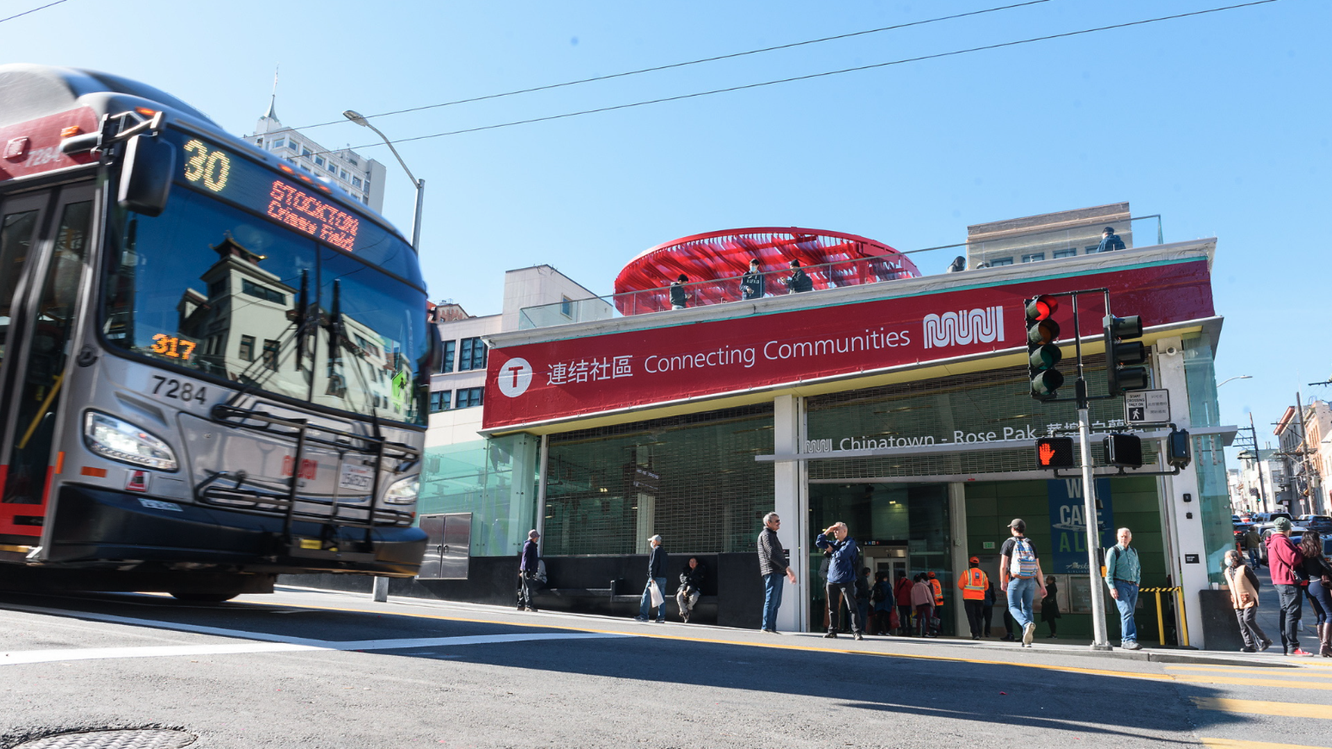 People Outside Chinatown Station on Opening Day of Free Weekend Shuttle Service in Central Subway