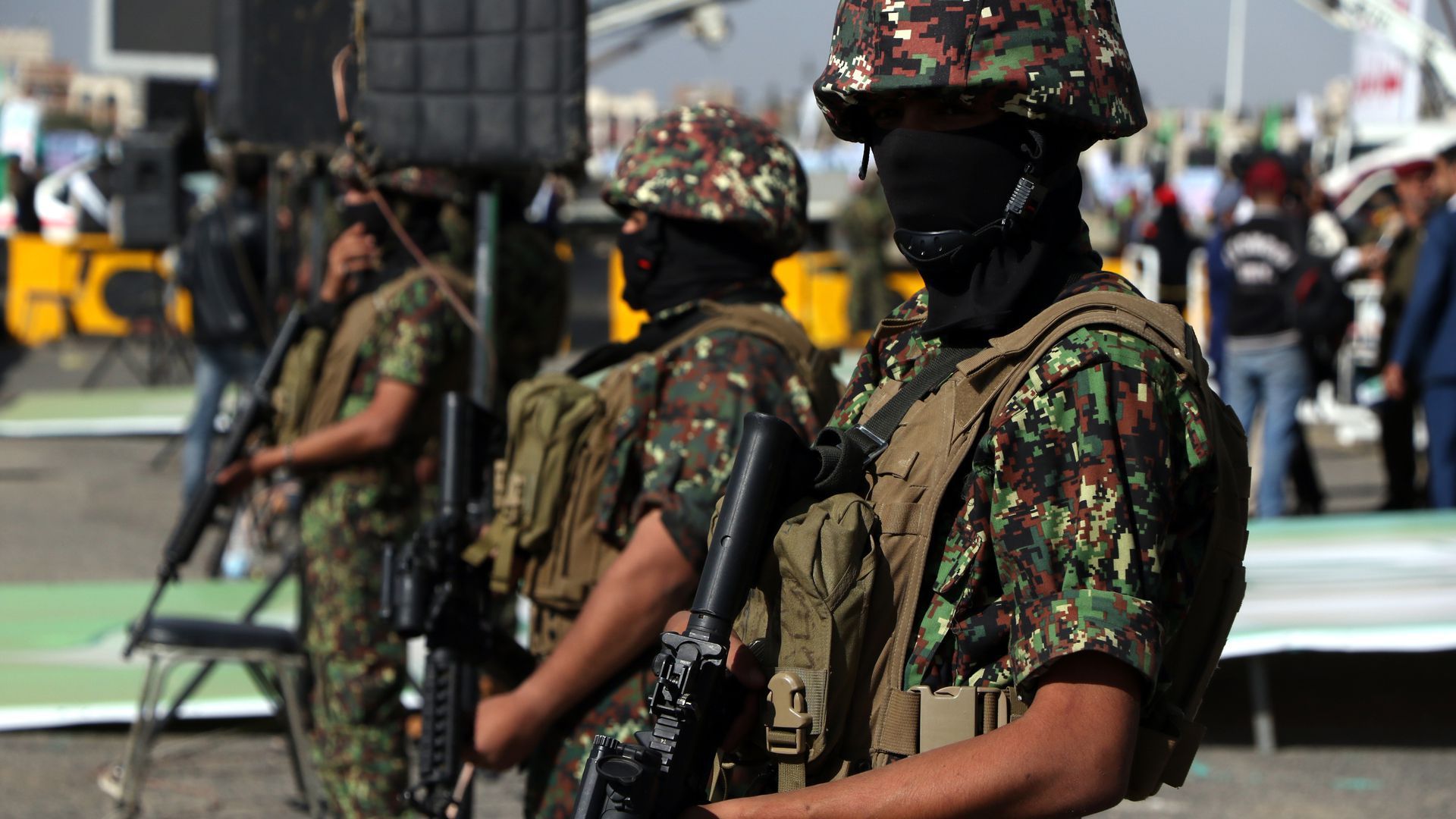 Photo of soldiers in combat gear and masks