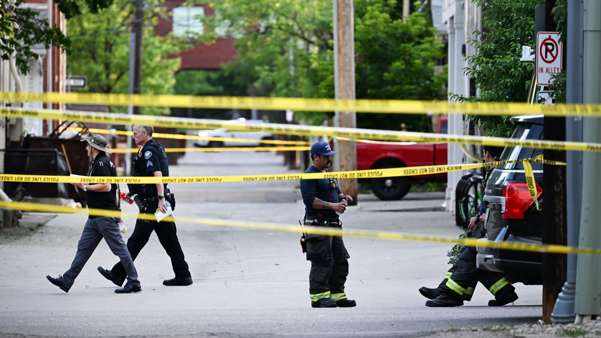 Yellow tape stretches around the area where a man attacked a pro-Israel rally.