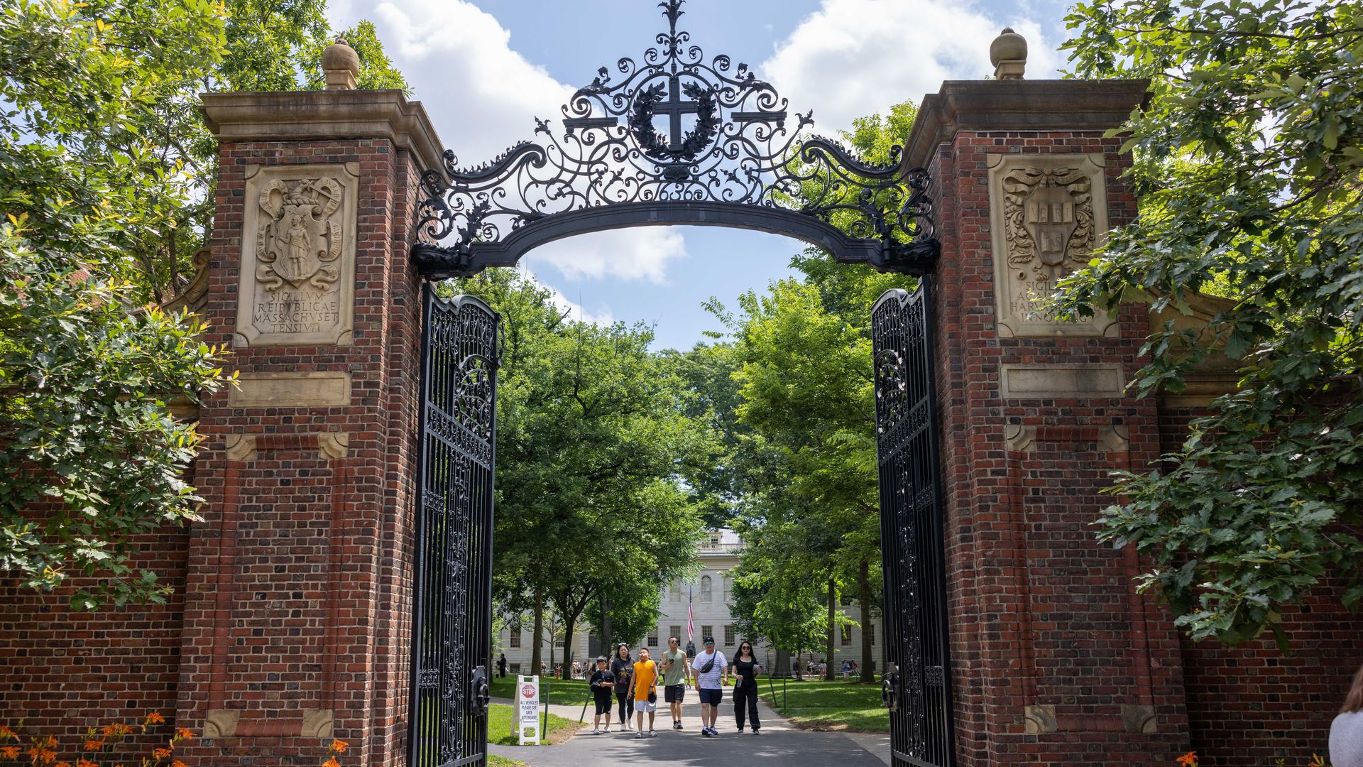 People walk through the gate on Harvard Yard at the Harvard University campus on June 29, 2023 in Cambridge, Massachusetts. The U.S. Supreme Court ruled that race-conscious admission policies used by Harvard and the University of North Carolina violate the Constitution, bringing an end to affirmativ