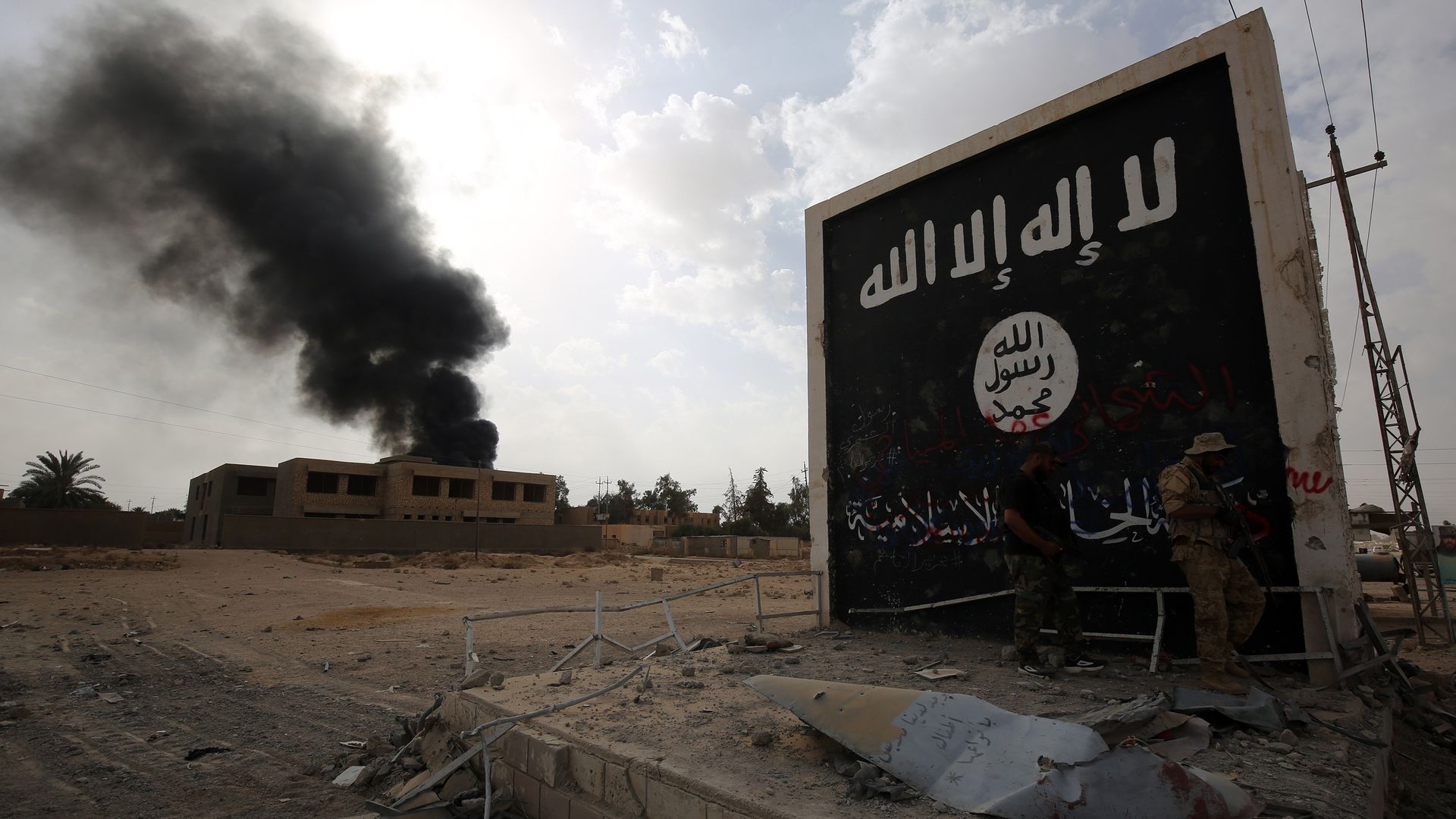 A wall depicting the Islamic State flag near the city of al-Qaim in Iraq in November 2017.