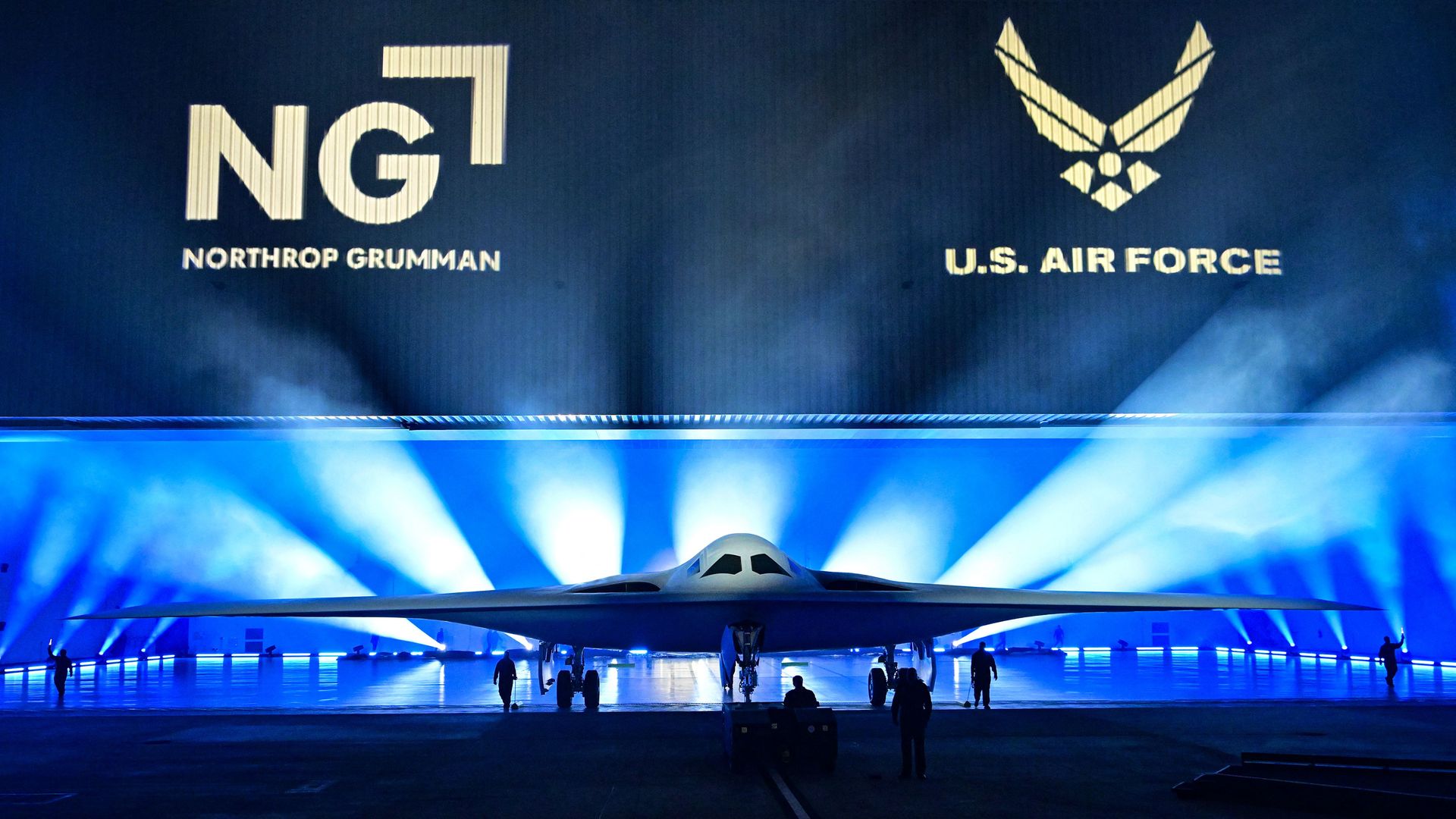 The B-21 Raider is unveiled during a ceremony at Northrop Grumman's Air Force Plant 42 in Palmdale, California, December 2, 2022. - The high-tech stealth bomber can carry nuclear and conventional weapons and is designed to be able to fly without a crew on board. 