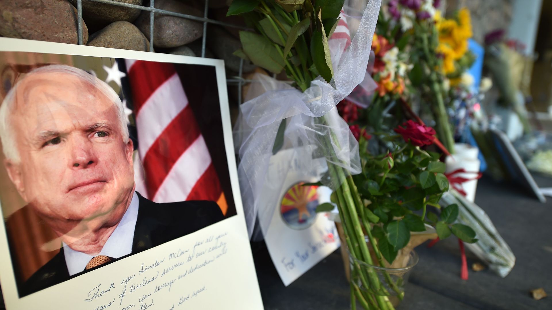 A makeshift memorial to Sen. John McCain outside his office in Phoenix, Arizona. Photo: Robyn Beck/AFP/Getty Images