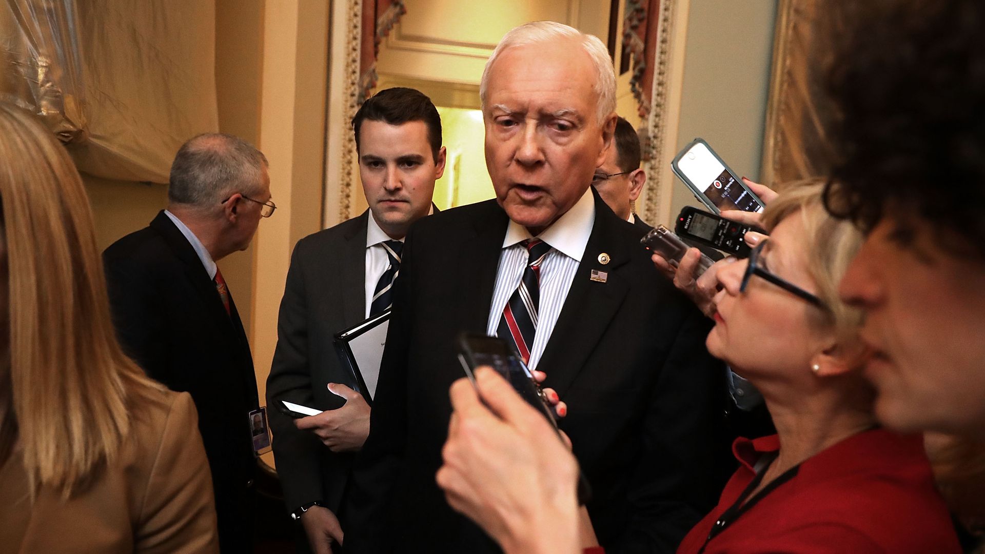 Orrin Hatch talks to reporters