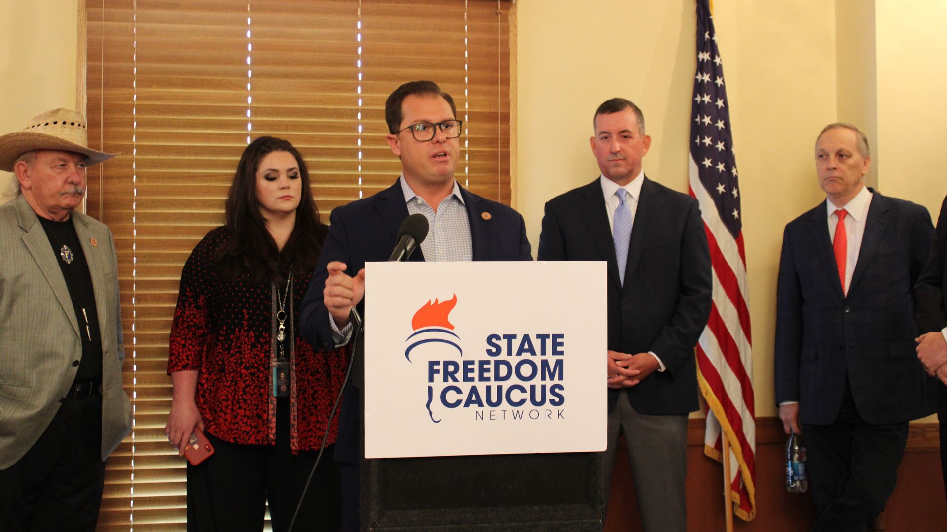 Arizona state representative Jake Hoffman speaks at a press conference at the historic state capitol