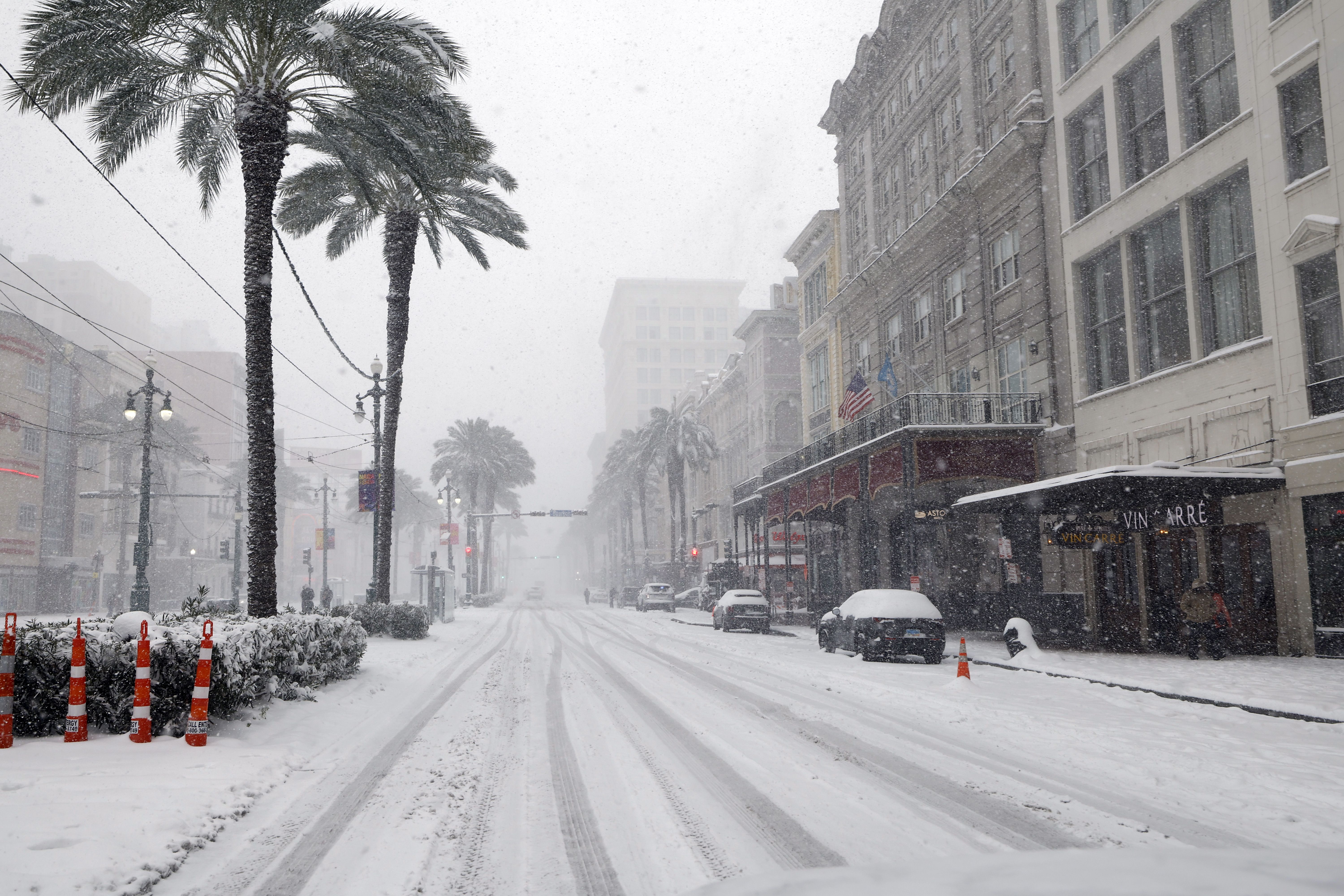 Photo shows snow on Canal Street.