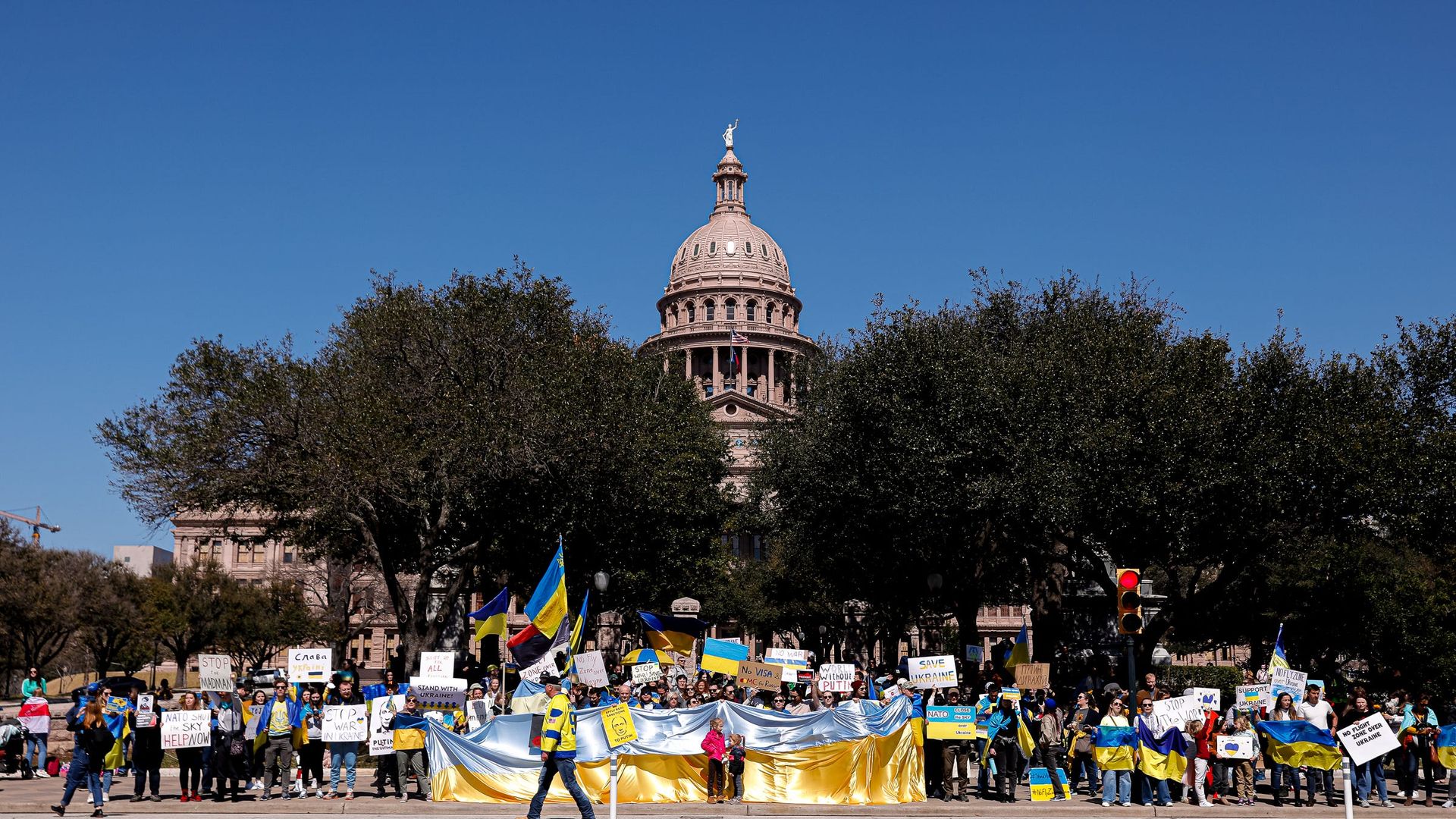 Protesters rally to support the Ukraine in front of the Texas Capitol.