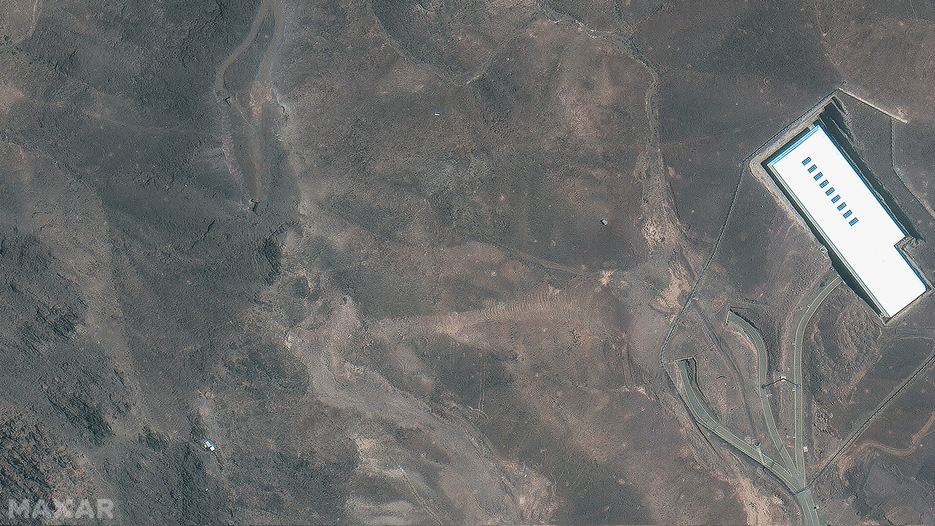 Satellite images show the Fordow nuclear site before and after Saturday's strike.