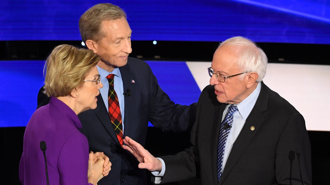 Warren, Sanders clash at Iowa debate — photos