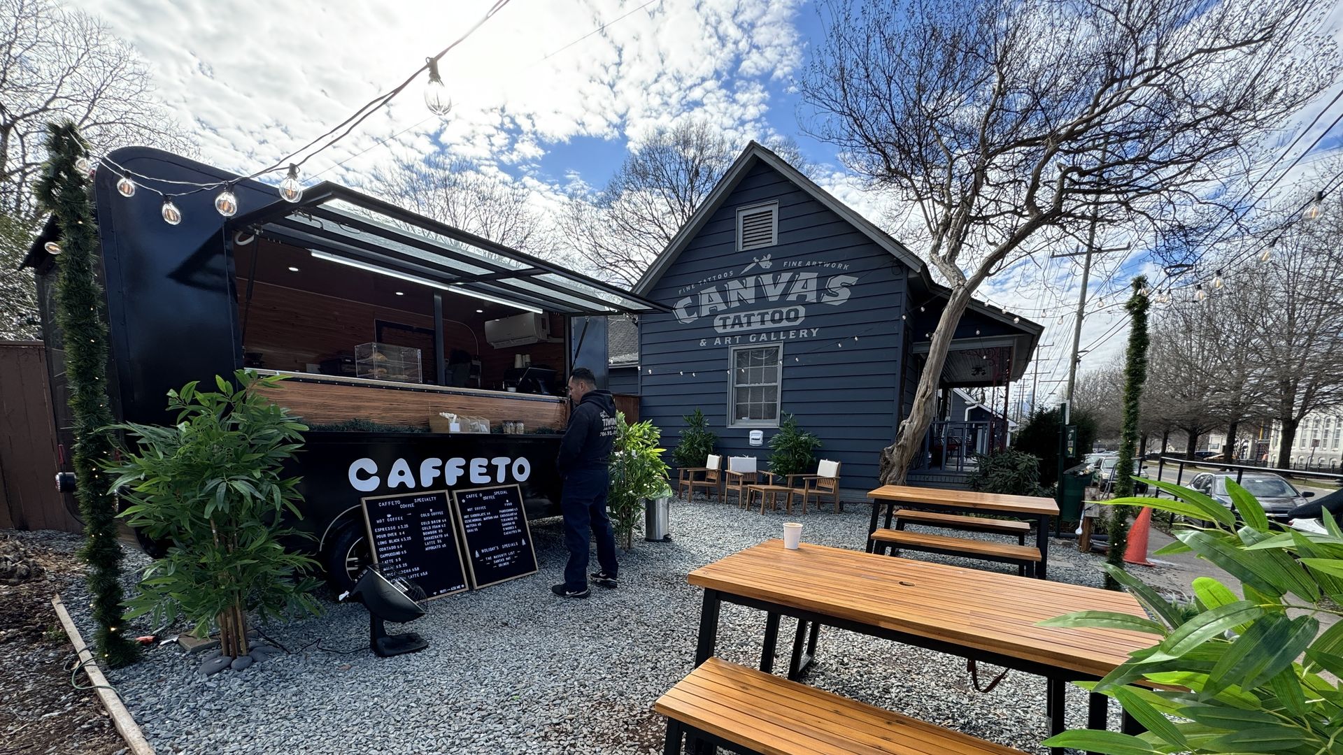 coffee trailer with picnic tables outside