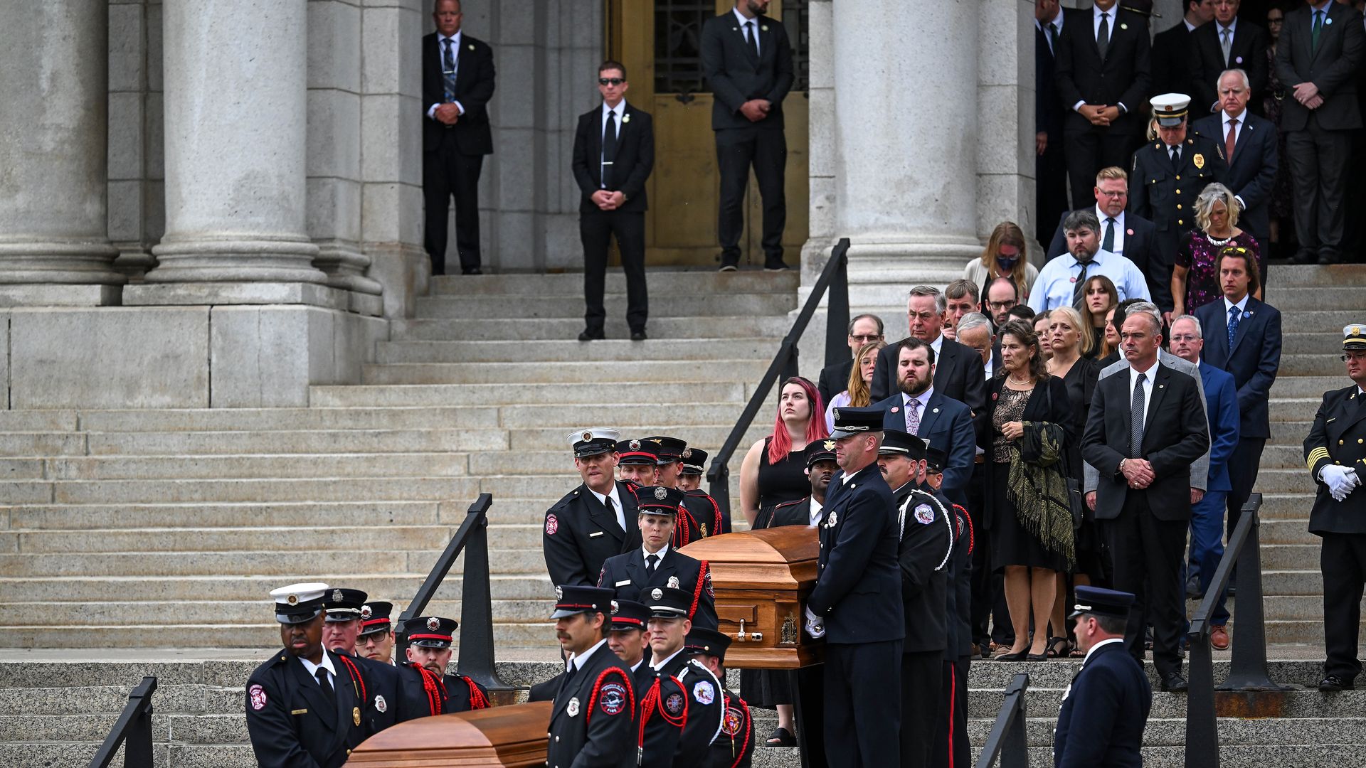JUNE 28: Family members follow behind the casket for Representative Melissa Hortman and her husband Mark Hortman's as it is carried to a waiting hearse after their funeral at the Basilica of St. Mary on June 28, 2025 in Minneapolis, Minnesota. The Hortman's along with their dog Gilbert were killed b