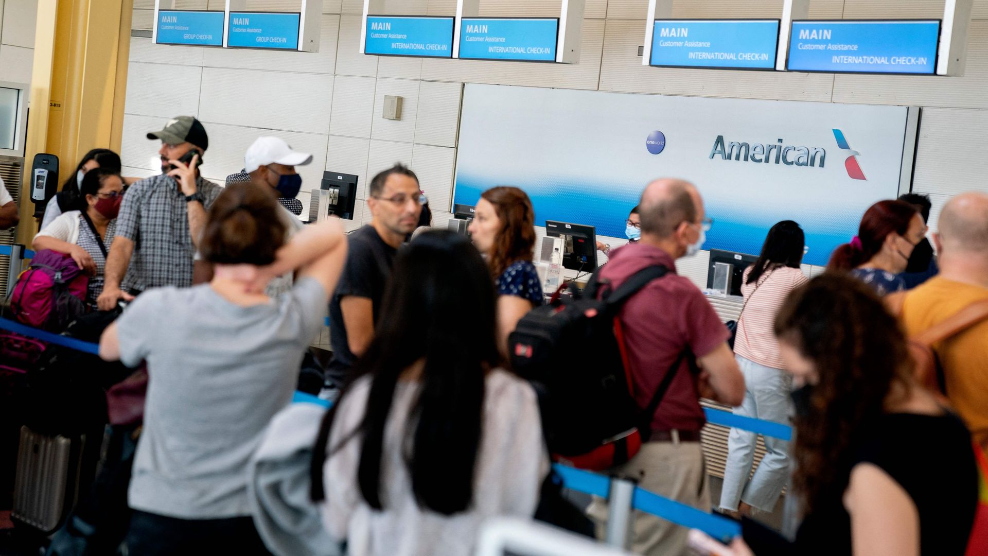 Upset passengers at an American Airlines gate