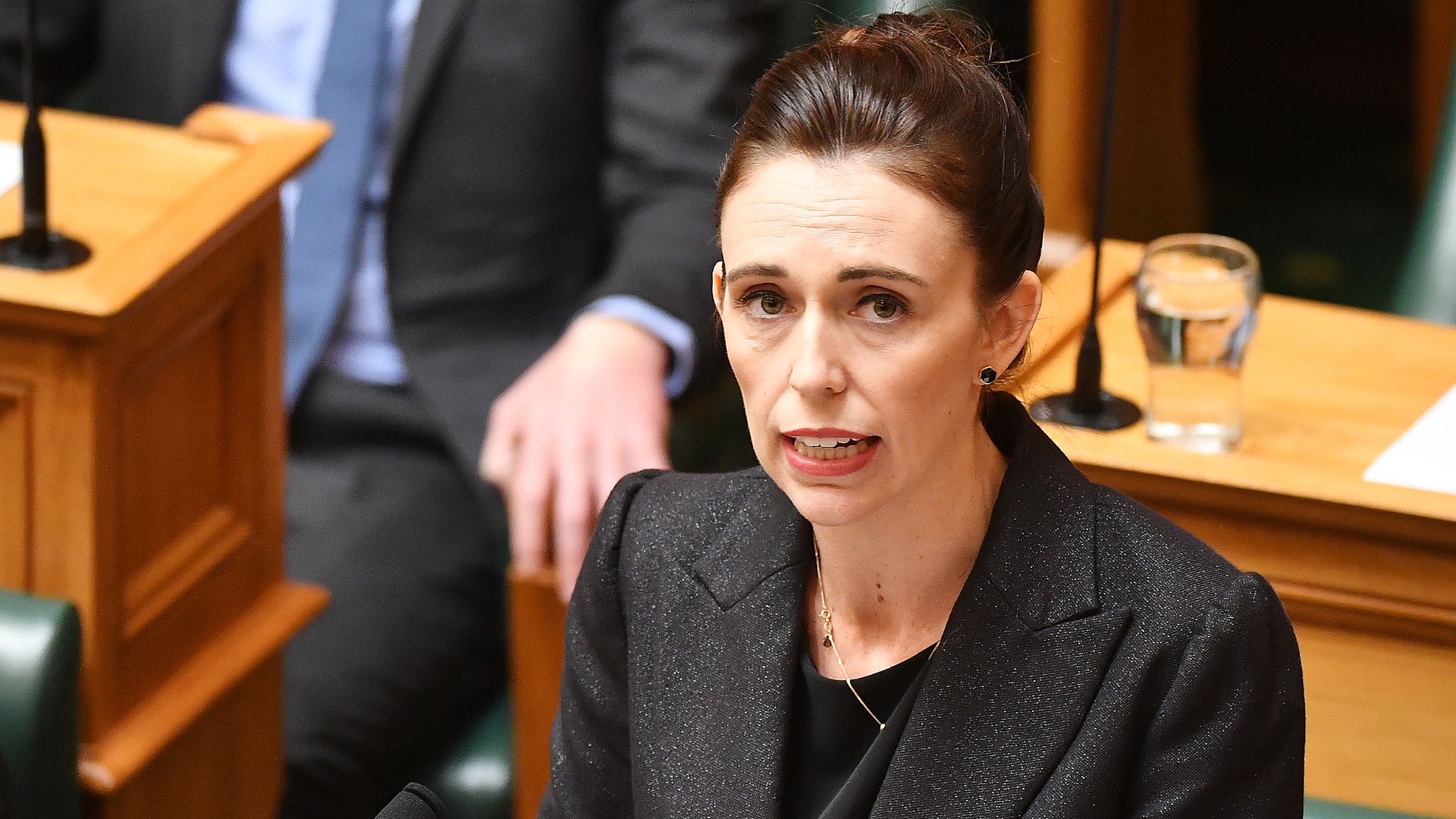 New Zealand Prime Minister Jacinda Ardern pays tribute to the mosque attack victims in Parliament.