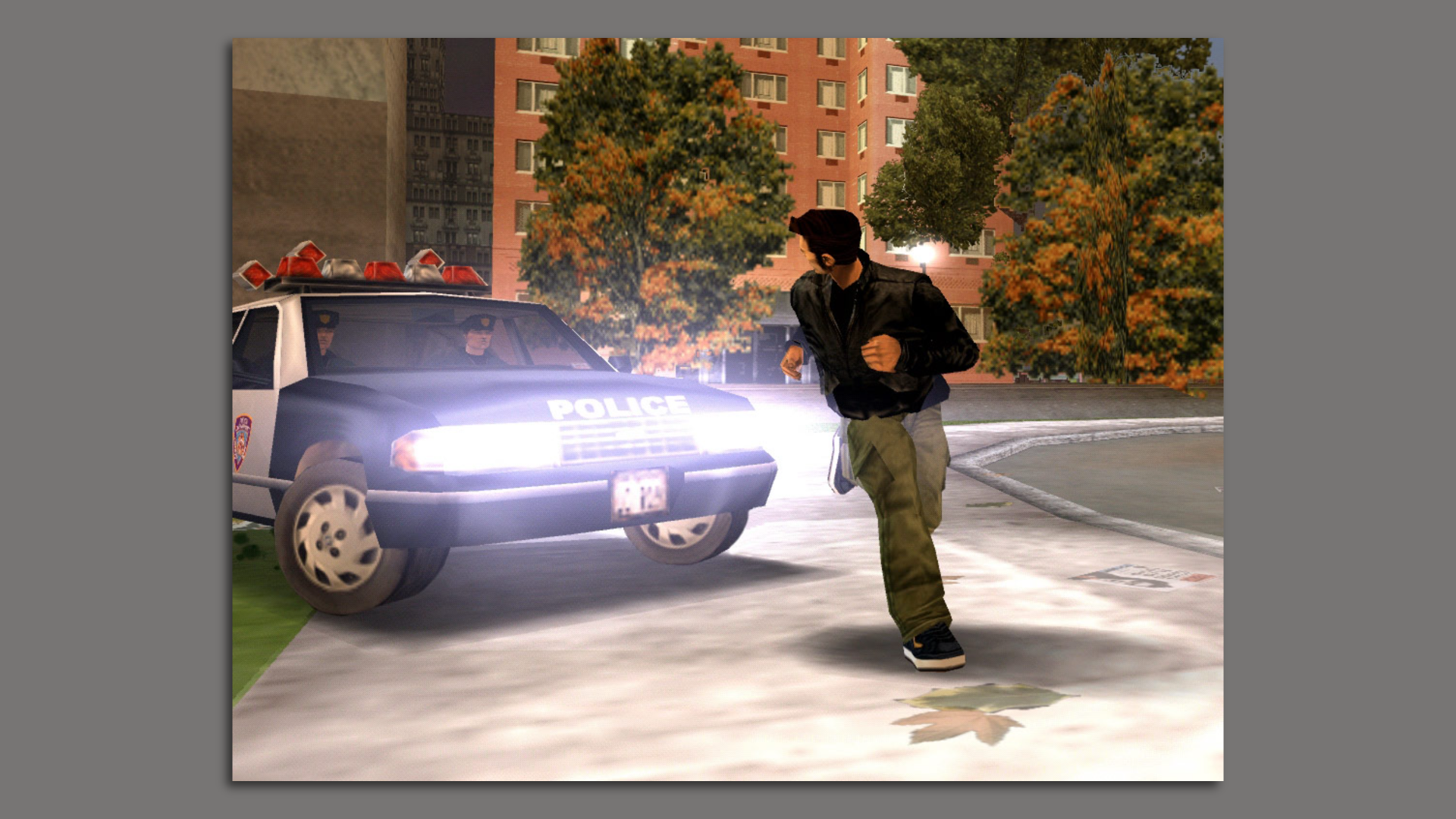 Video game screenshot of a man being chased by a police car